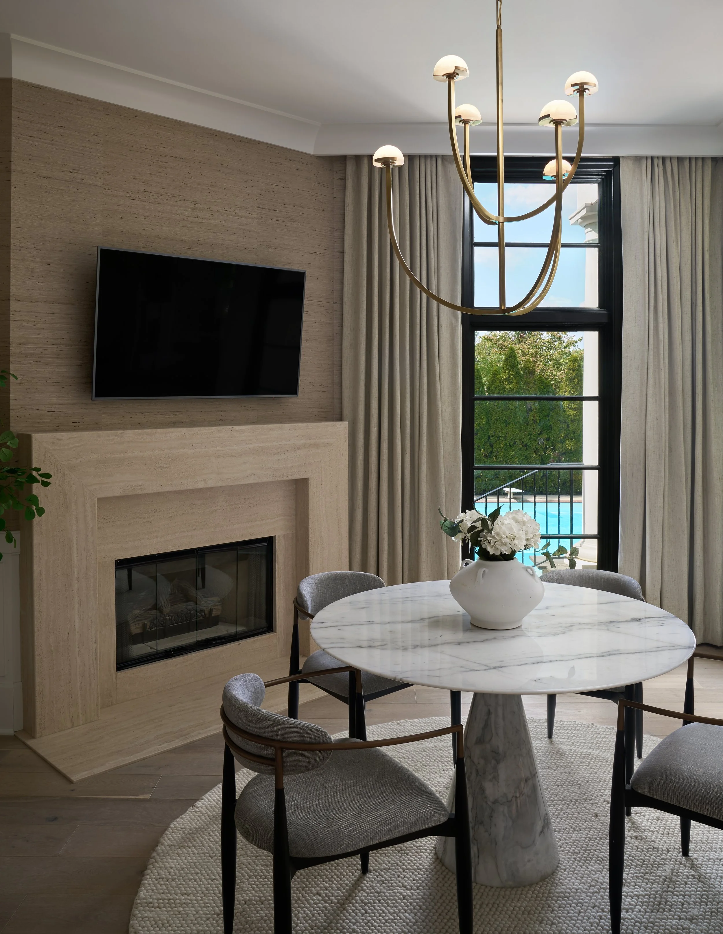 This elegant dining space in a fully remodeled home in Bexley, Ohio reflects the sophisticated, tailored approach of Benham & Co Interior Design, a premier Columbus Ohio interior designer specializing in full-service interior design and luxury home r