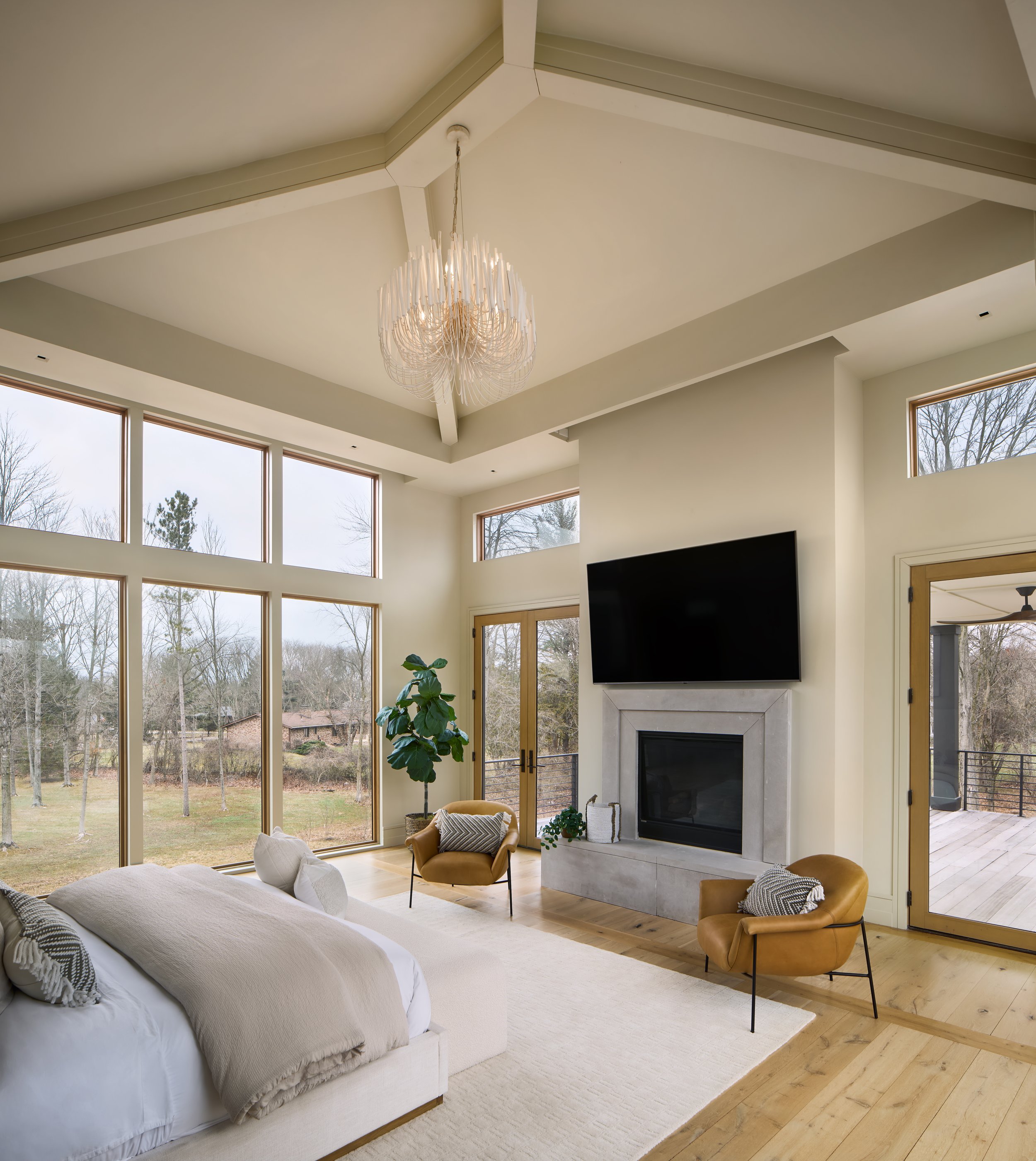 Modern Mediterranean Primary Bedroom with Visual Comfort Lighting located in Powell, Columbus, Ohio. Luxury Interior Design at it Best. 