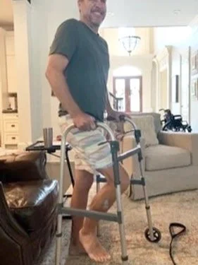 Working on hip mobility at home after the accident. Pelvic fractures without surgery are very painful as you can see in his face! 