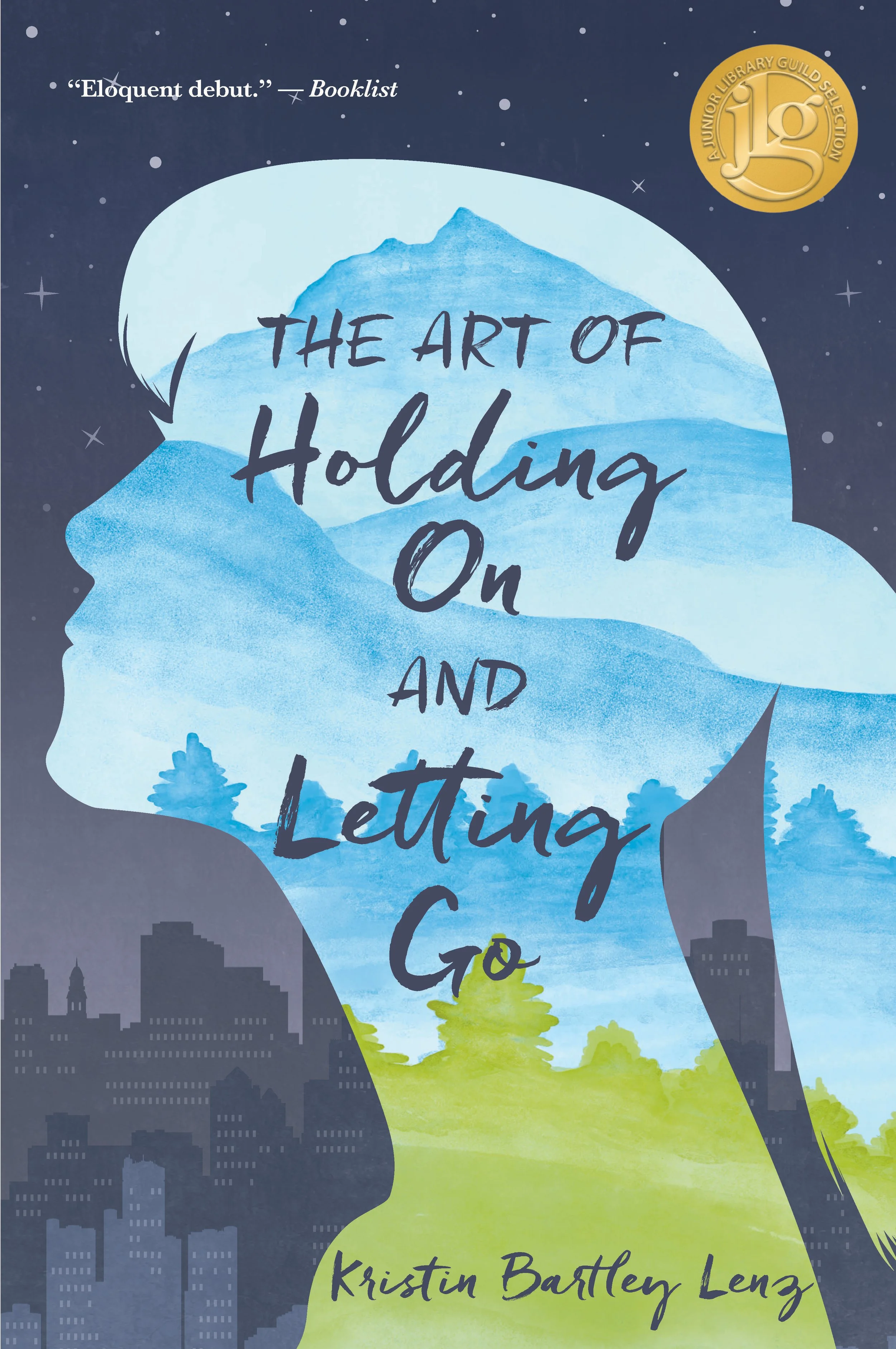 Book cover for 'The Art of Holding On and Letting Go' by Kristin Bartley Lenz, featuring a silhouette of a woman's profile with a landscape scene inside, showing mountains, trees, and city buildings against a dark starry sky.