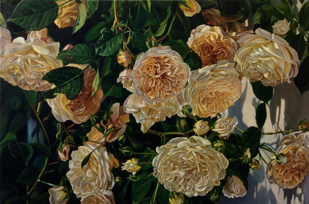 Rosenbild von Lars Reiffers mit cremefarbenen Blüten und grünen Blättern in natürlichem Licht.