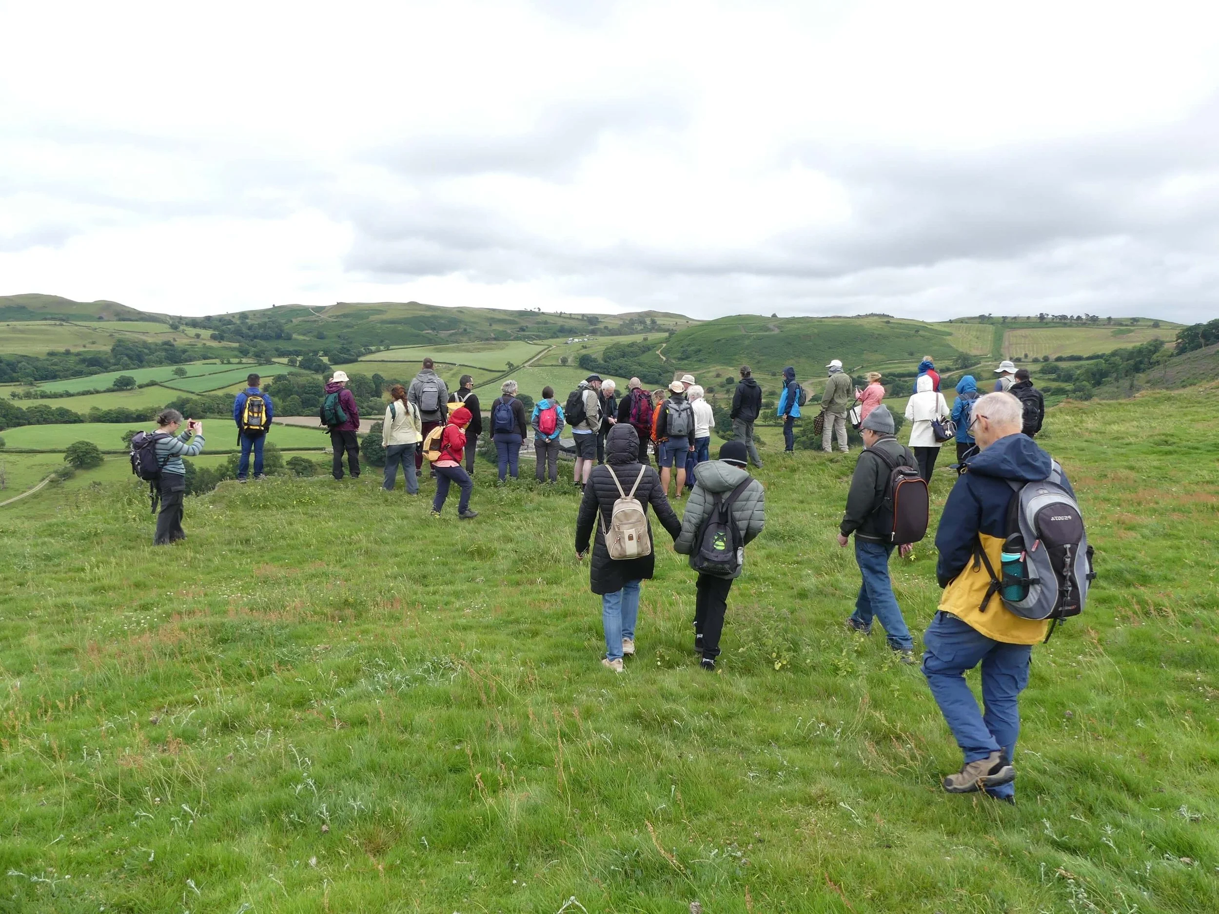 Group of people on guided tour of Cefnllys Castle