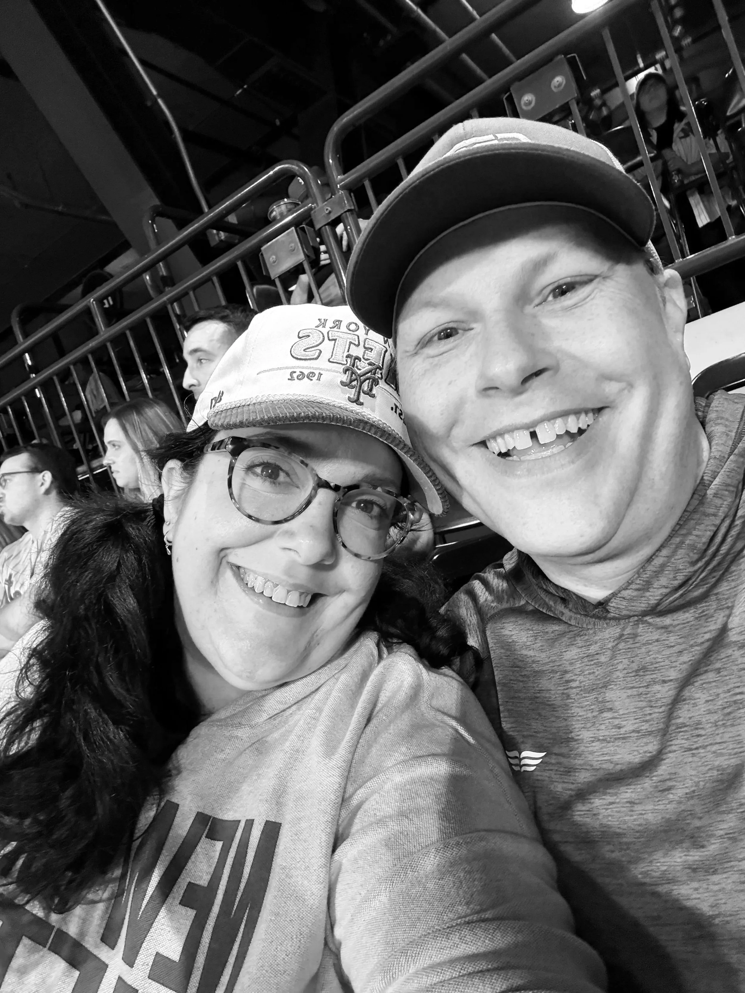 Courtney & Chip enjoy a Mets game