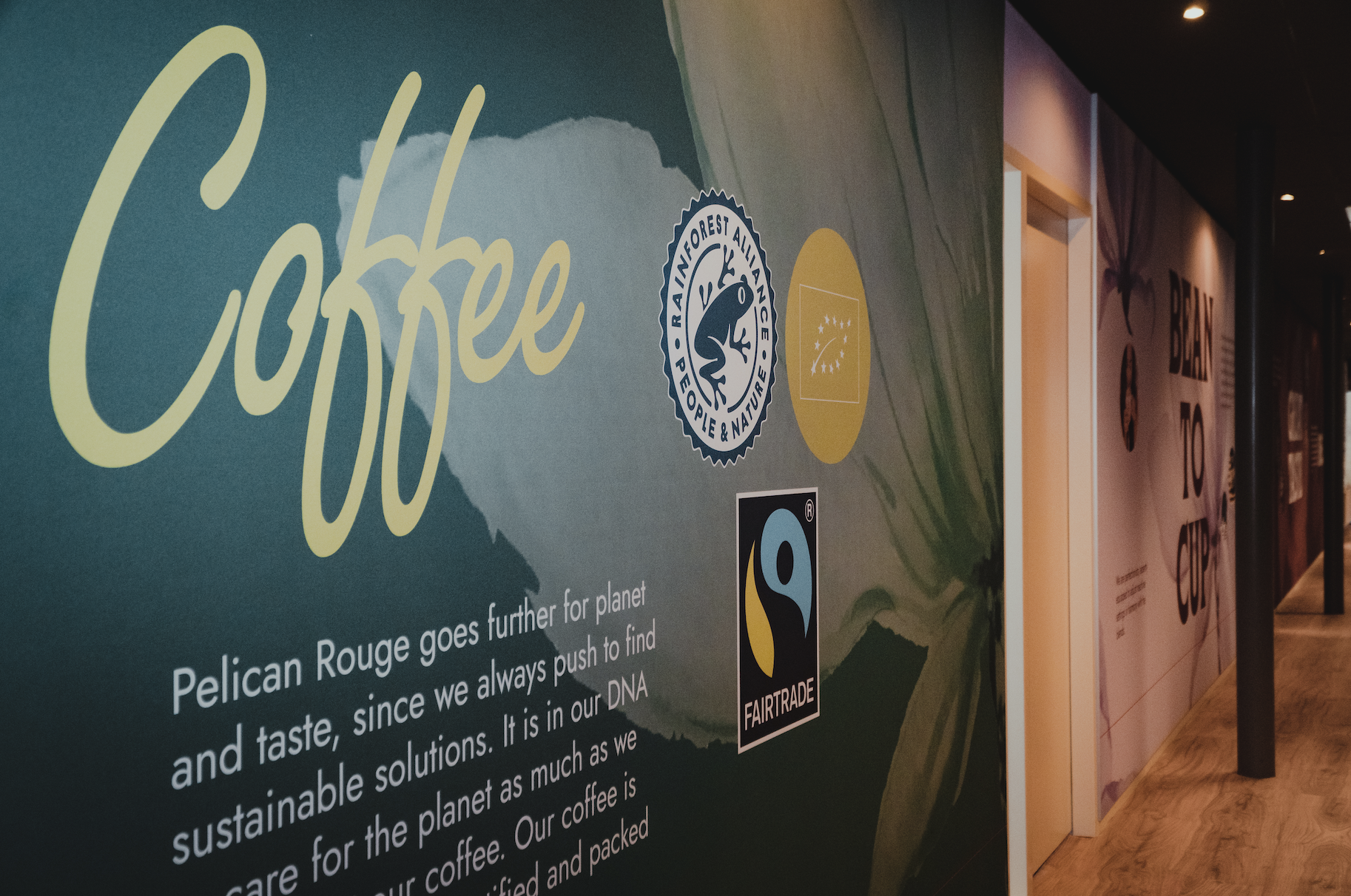 Pelican Rouge certified coffee CO2 neutral design wall green.png