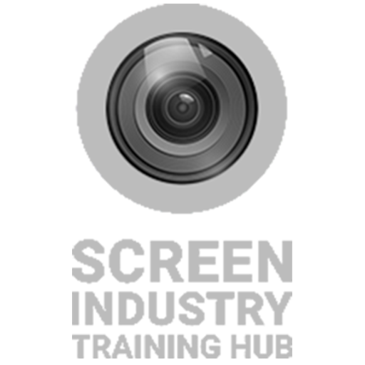 Close-up of a camera lens with a gray background.