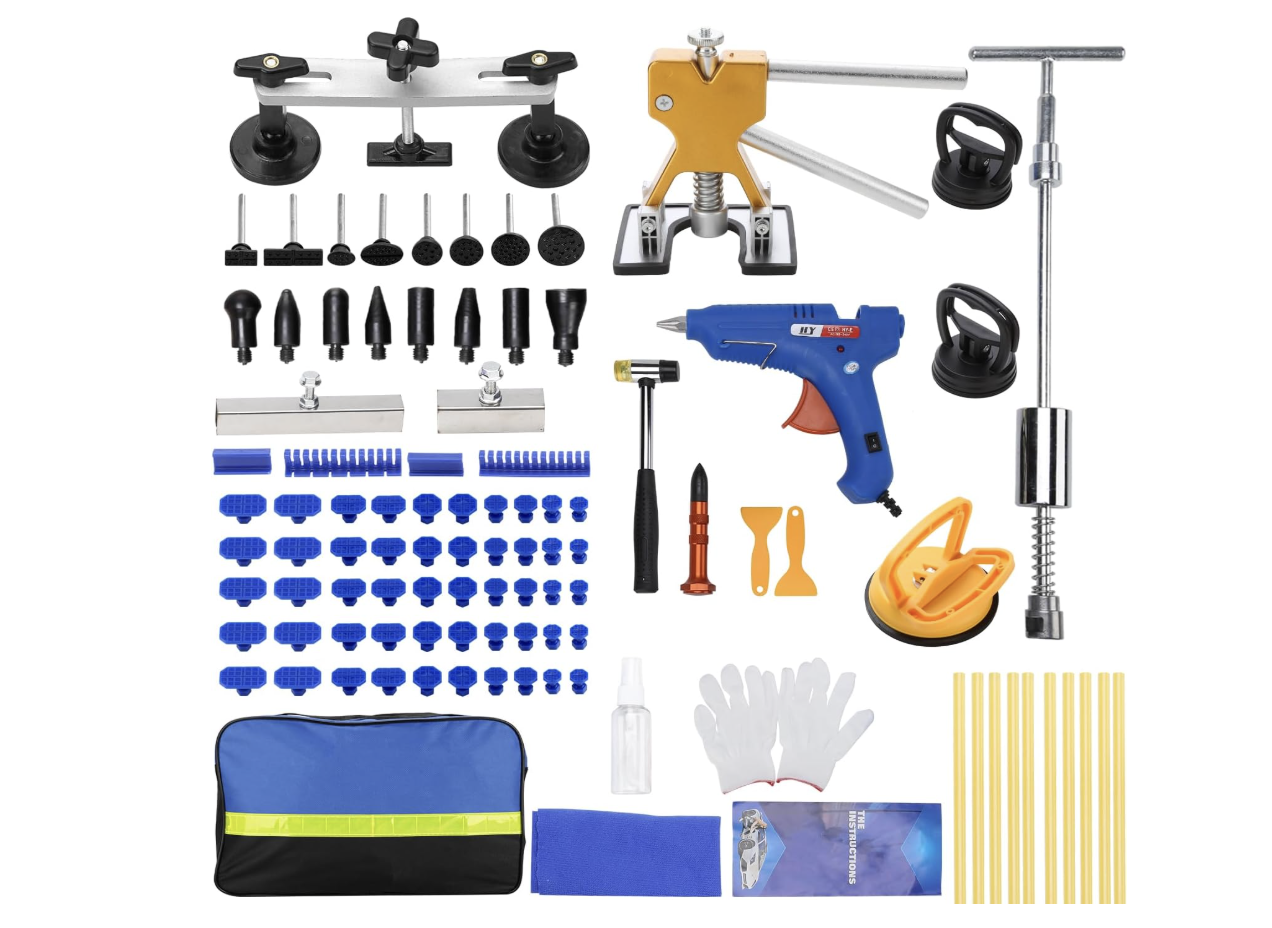 A 97-piece paintless dent repair (PDR) kit with a golden lifter, slide hammer, and glue gun for professional vehicle intake prep at the M7 Auto Ranch.