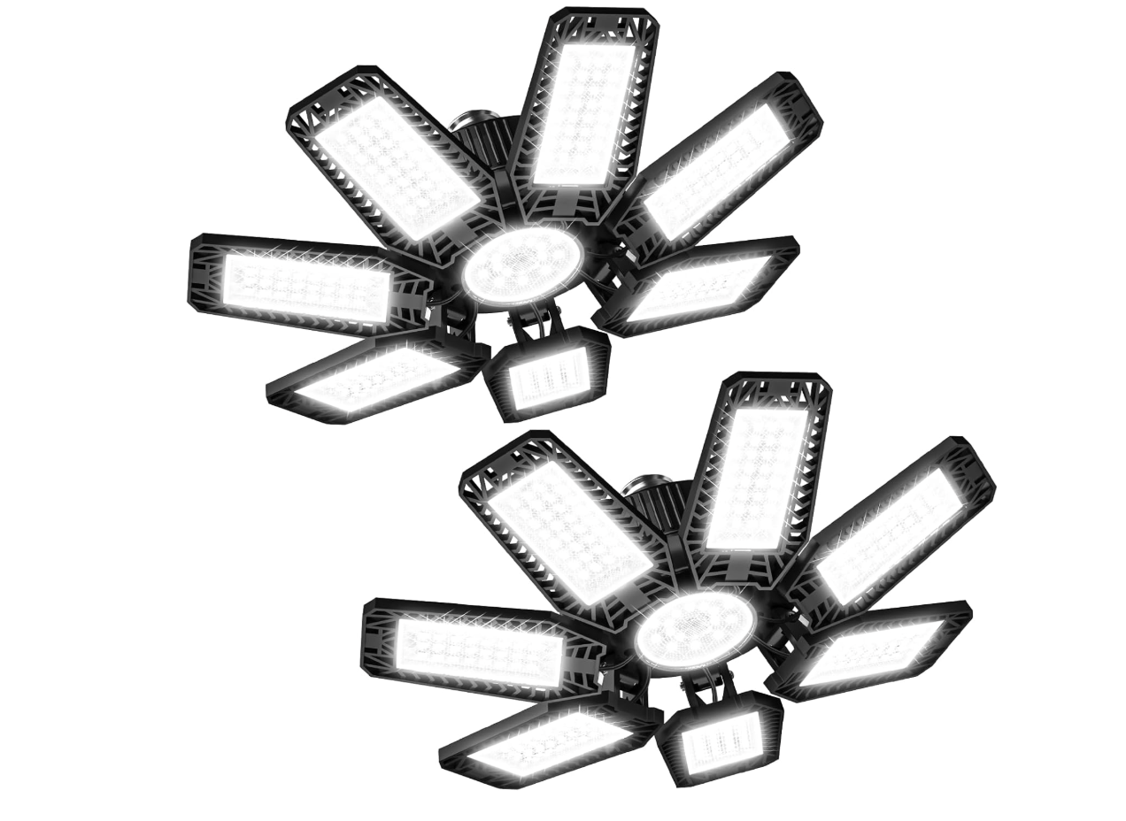 A 2-pack of 200W LED garage ceiling lights with 7+1 adjustable panels and 20,000 lumens of 6500K daylight for workshop and storage room lighting at the M7 Auto Ranch.