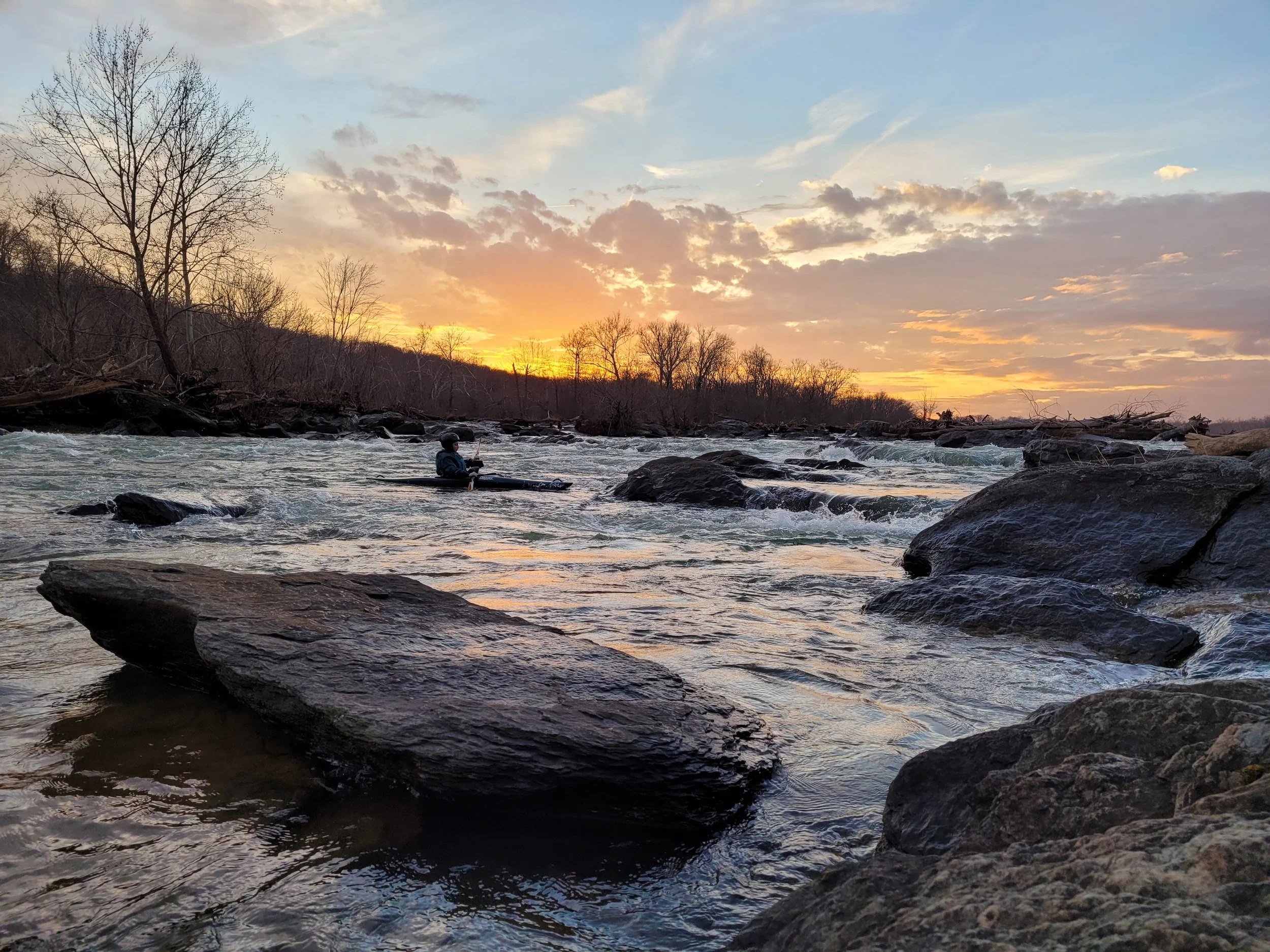 Sunset river kayaing