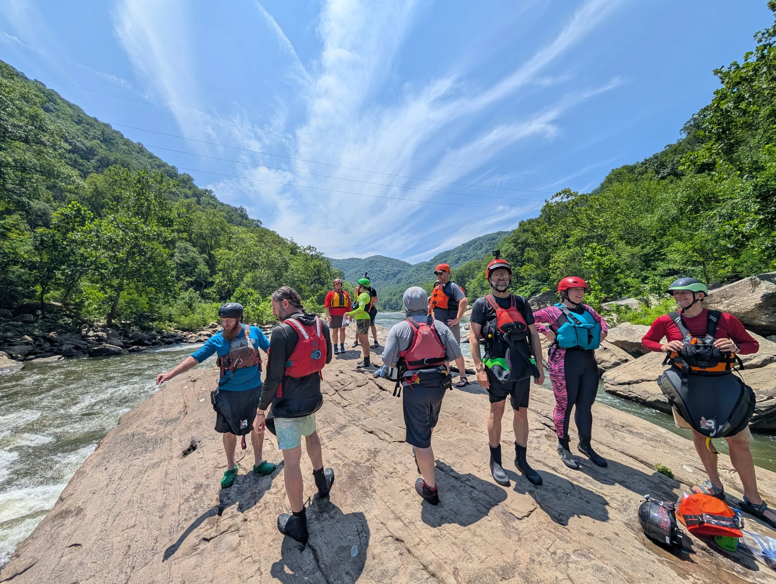 Kayakers scouting on the New River Gorge with team River runner