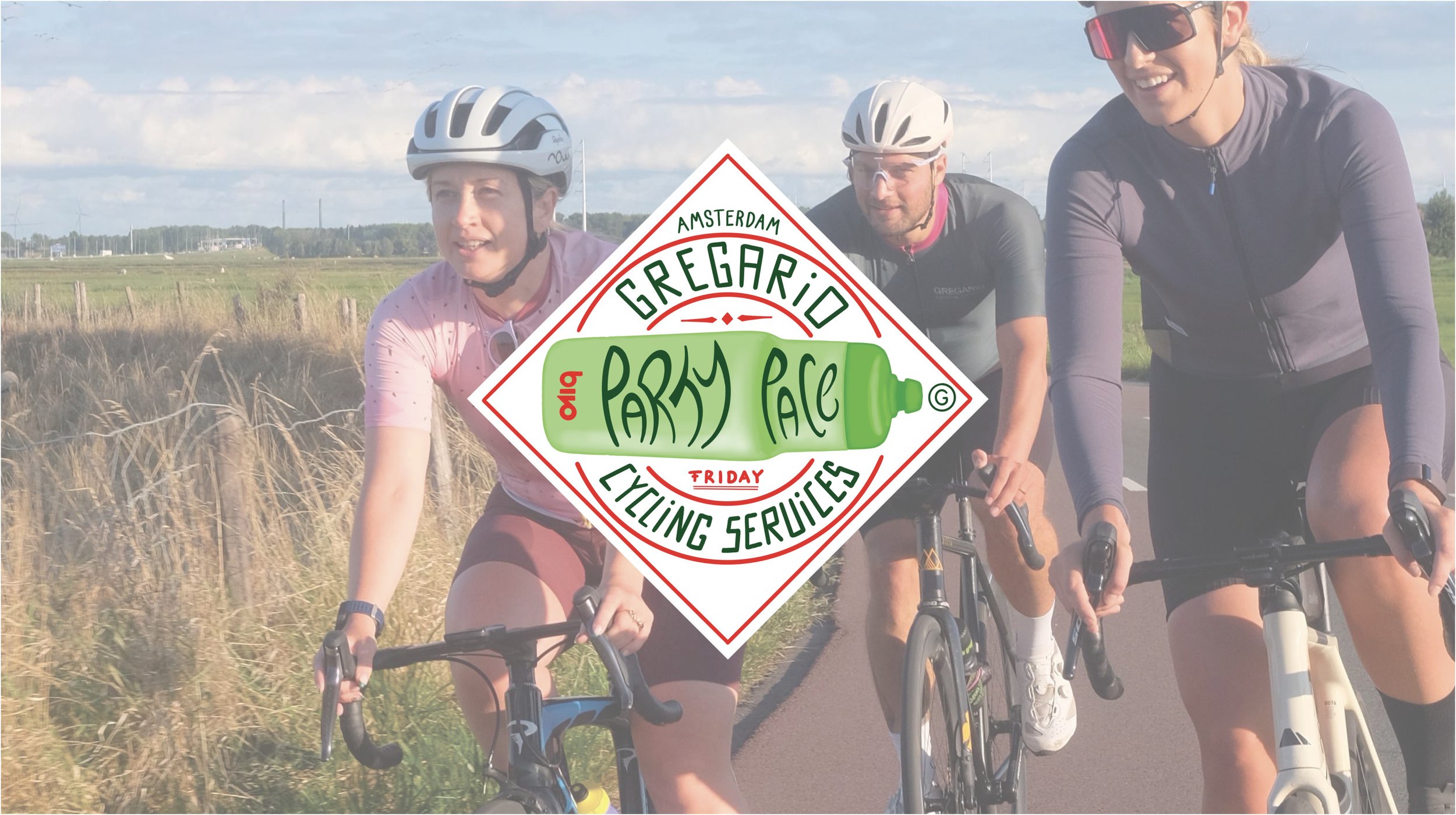 Close-up of a bicycle's crankset, chain, and pedals, with a background of flowers and brick pavement.