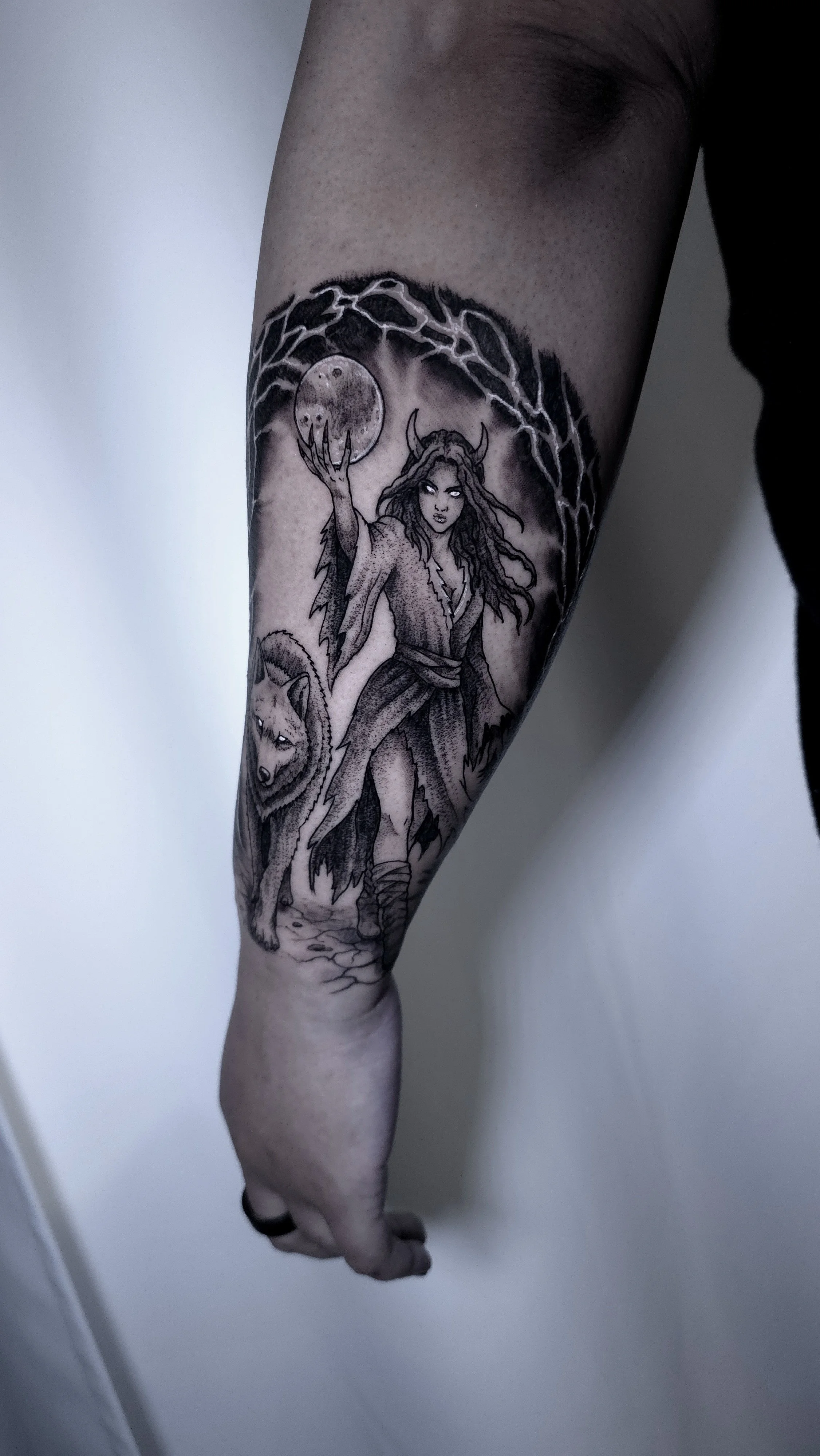 forearm-tattoo-of-a-dark-entity.jpg