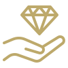 A hand holding a diamond
