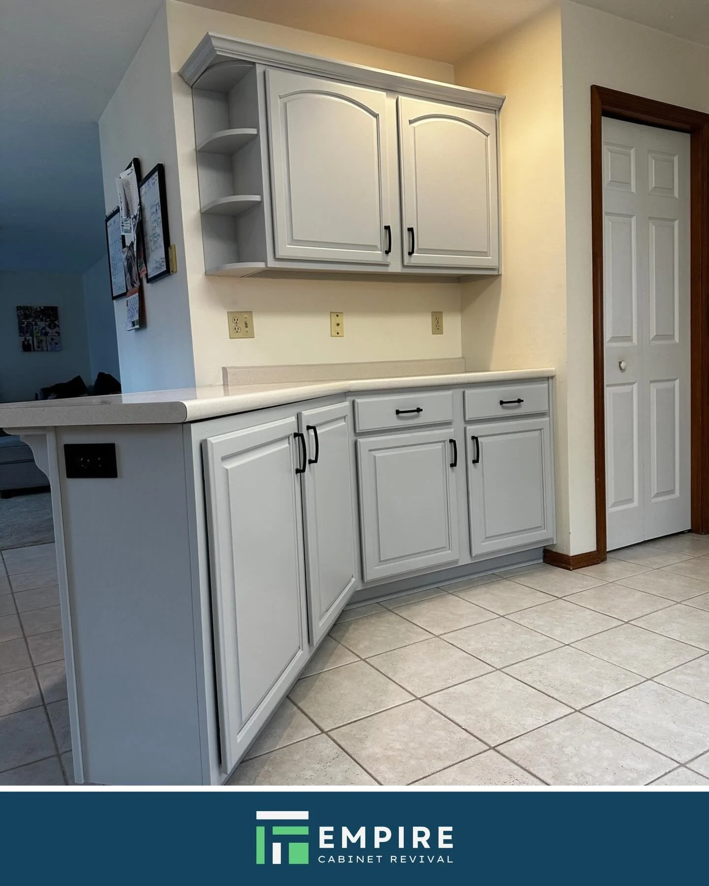 This kitchen kept its layout and gained a lighter, more balanced look.

|| empirecabinetrevival.com