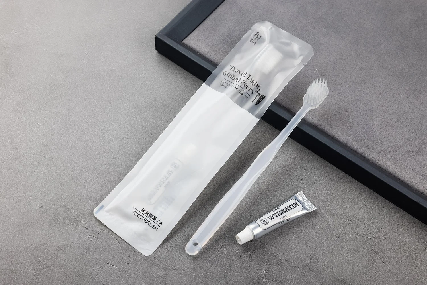 TB-008B｜柄：PP（ポリプロピレン）｜毛：ソフト・ナイロン先細テーパード 0.15mm｜全長18cm｜約12.4g/本｜クリア（柄）・ホワイト（毛）｜名入れ印刷可（紙箱／OPP個包装／紙袋）