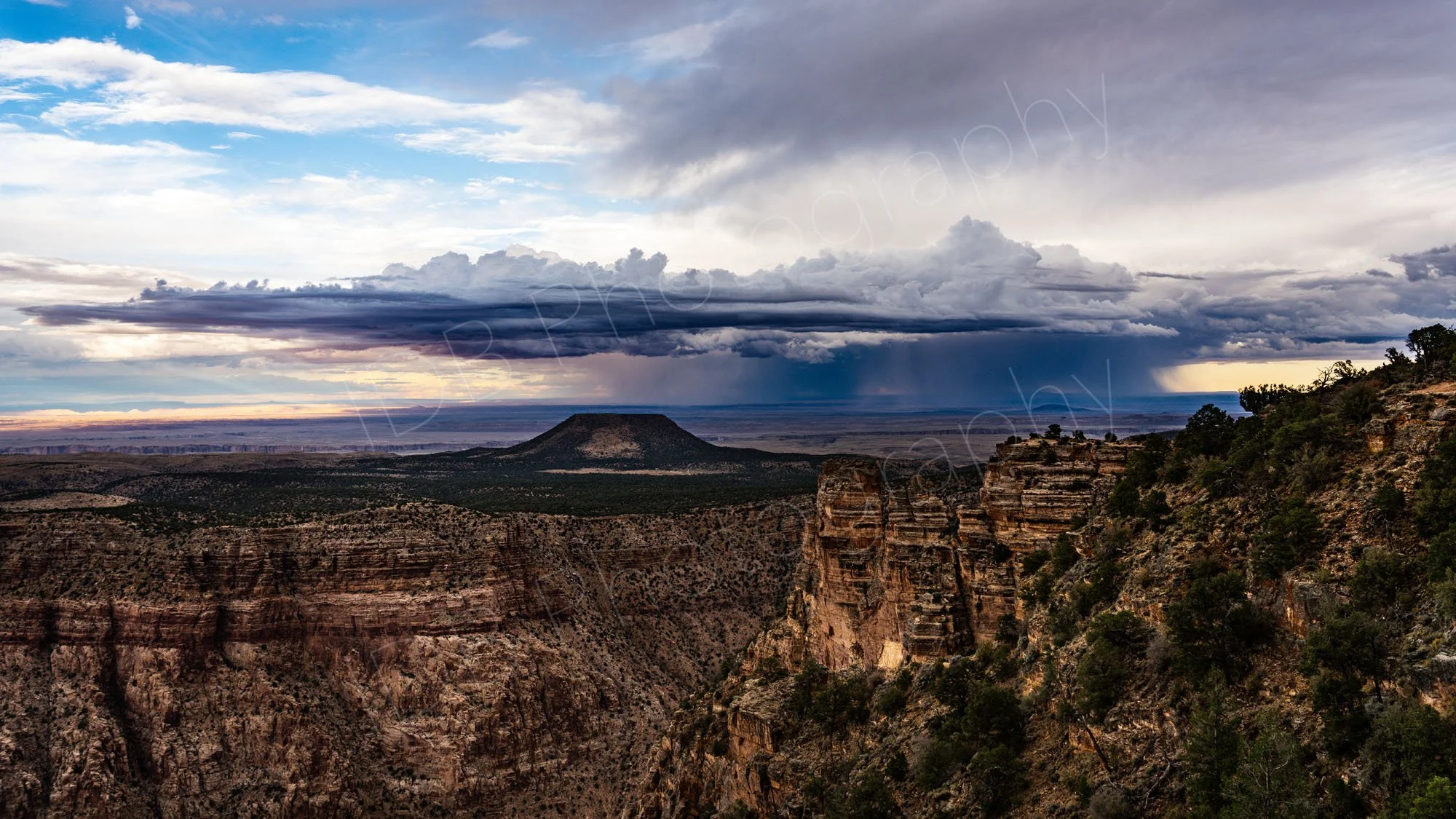 Cedar Mountain and the South Rim of Grand Canyon, Arizona with dramatic localised stormy sky.