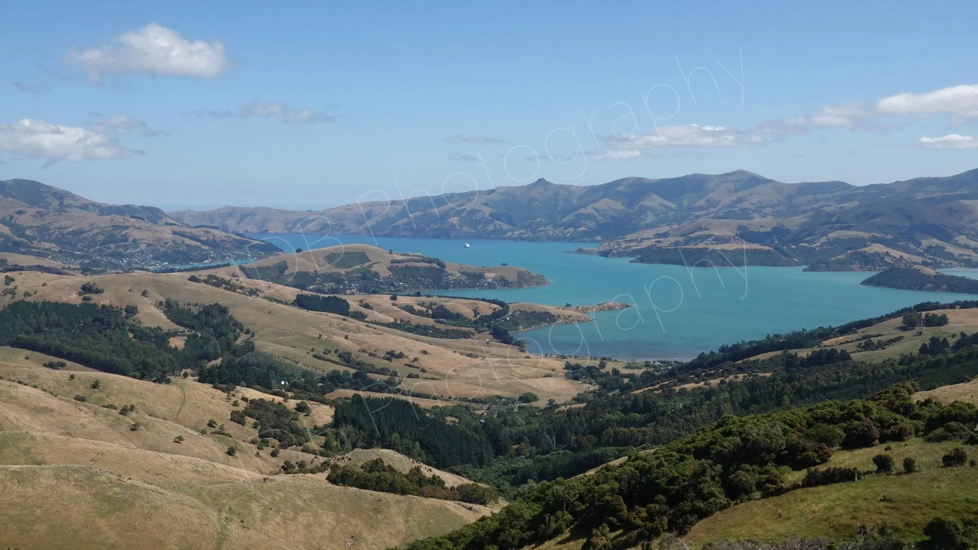 A view from the hills overlooking Akaroa Harbour, Banks Peninsula, New Zealand.
