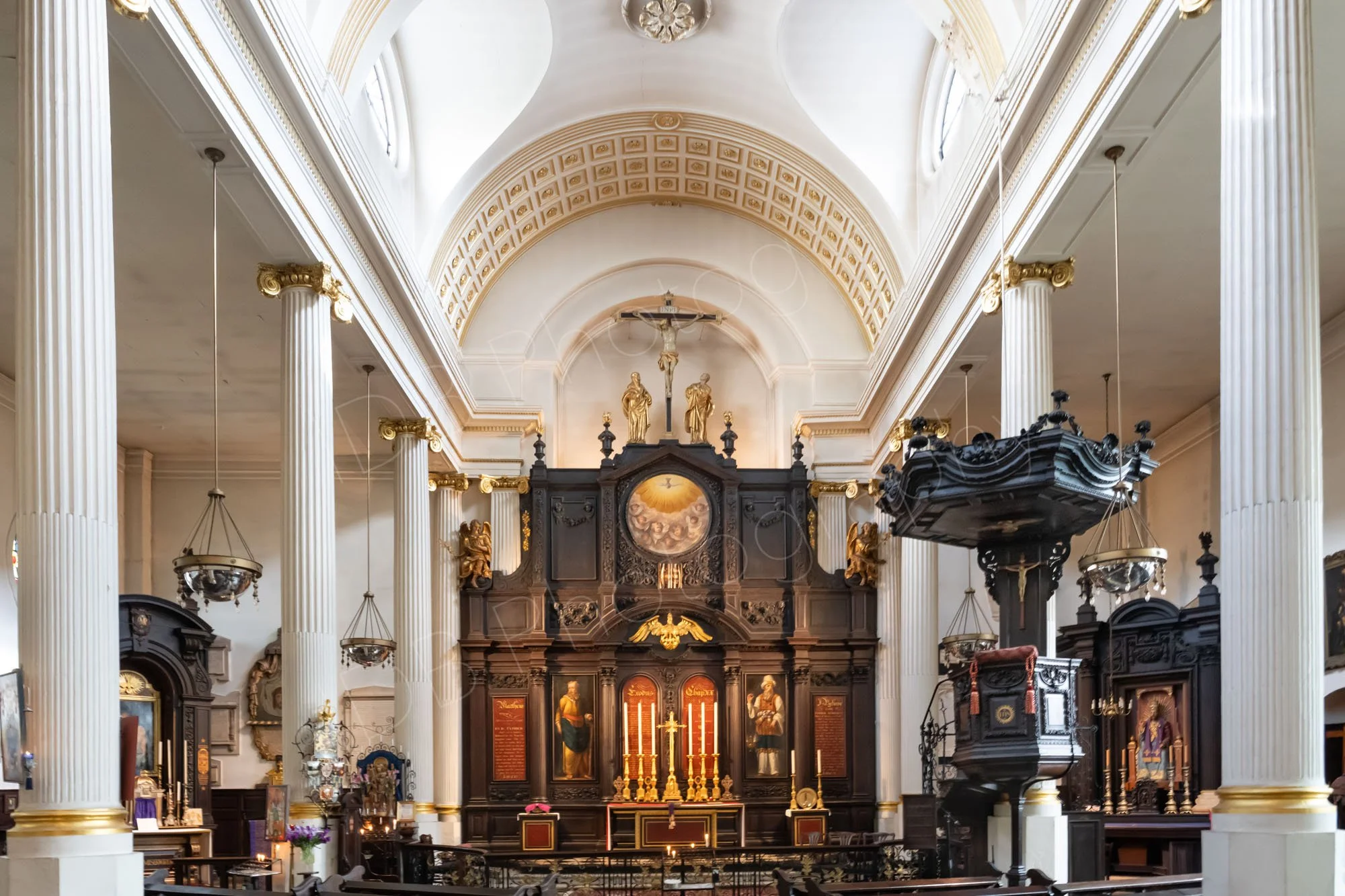 Inside the beautiful church of St Magnus The Martyr, in the City of London built by Sir Christopher Wren. Beautiful columns, ornate pulpit and altar.