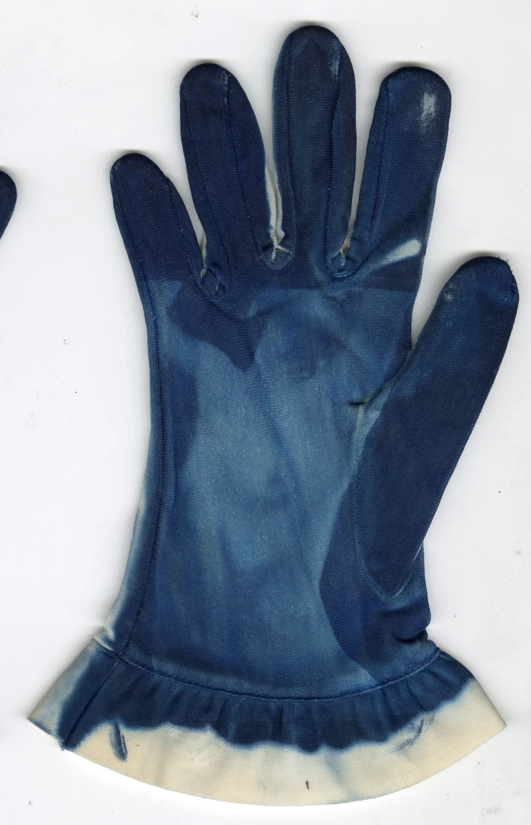 Heather Stewart -

Handled,

2026,
Cyanotype on glove,
5 x 8.5”,

$100