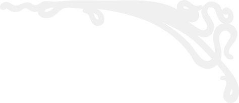 Decorative black and white ornate corner design with floral and scroll motifs.