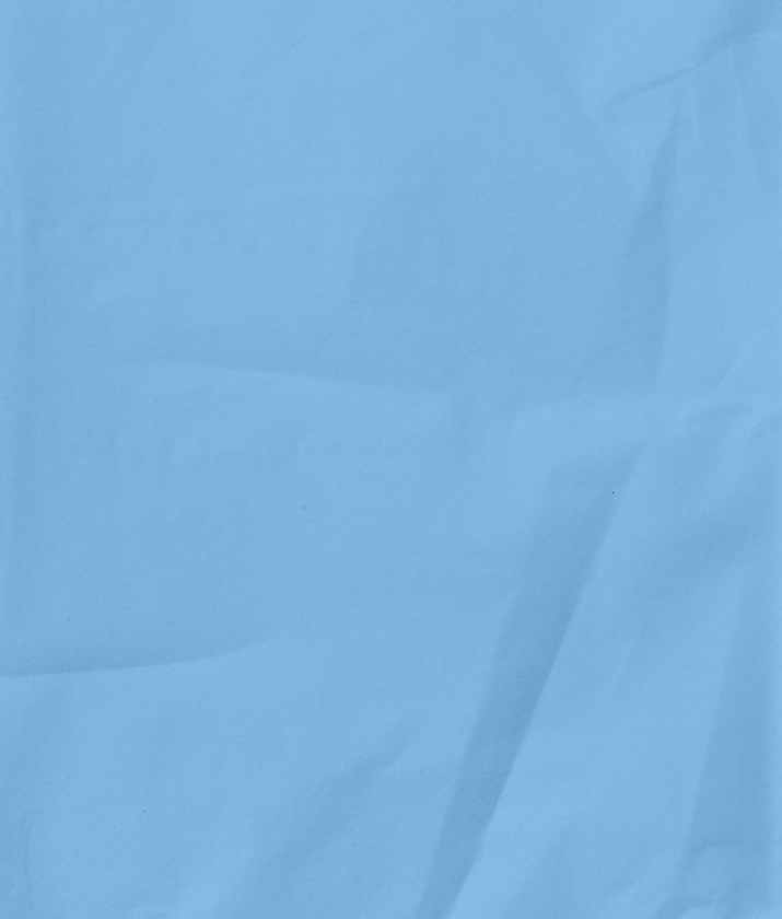 A crumpled piece of light blue paper.