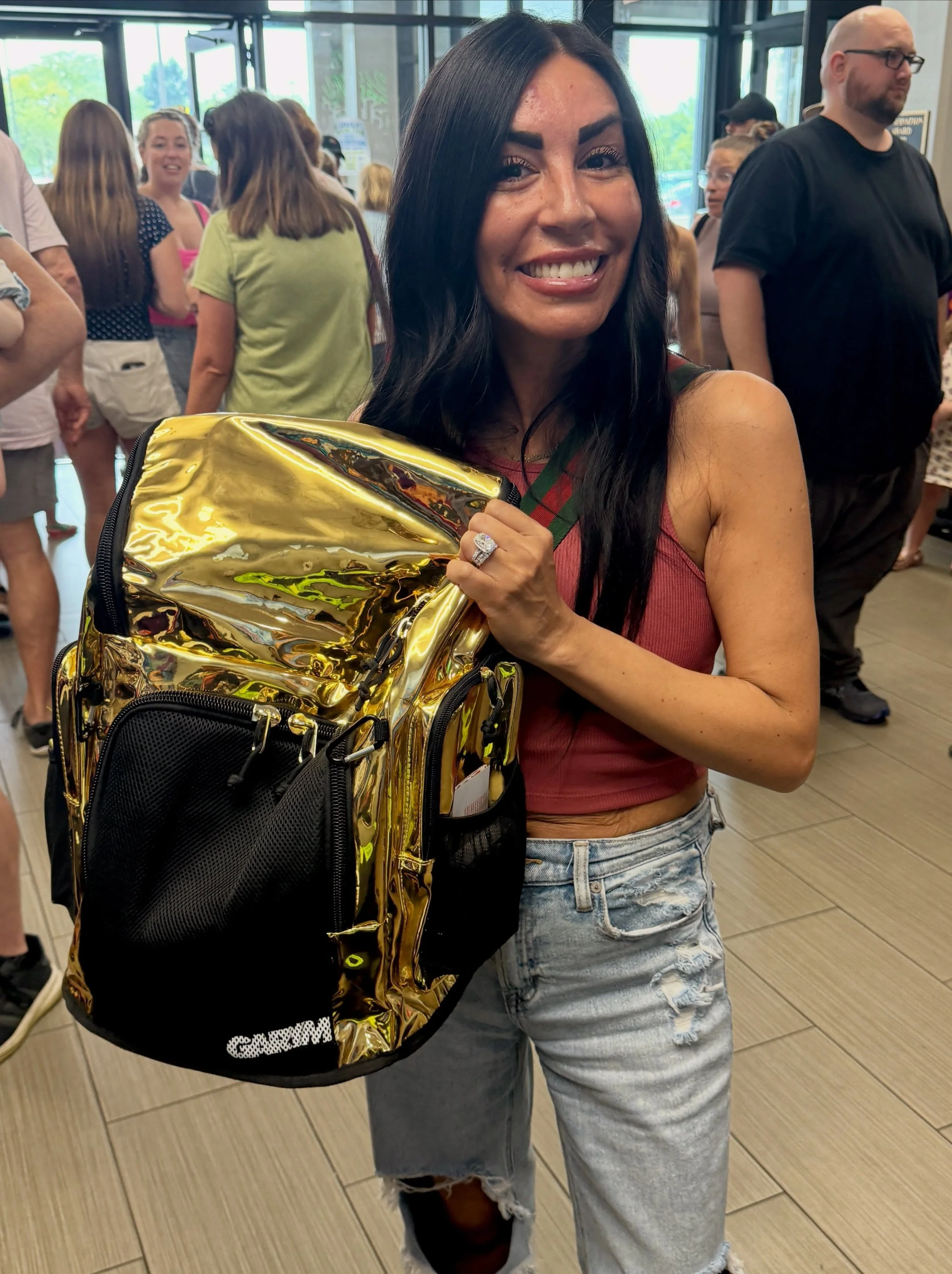 We have a WINNER 🌟🏆

Congratulations to our Golden Backpack winner! She&rsquo;s taking home the gold, and that smile says she&rsquo;s pretty happy about it 🤩

A huge THANK YOU to everyone who came out for our Summer Social and joined in the fun. W