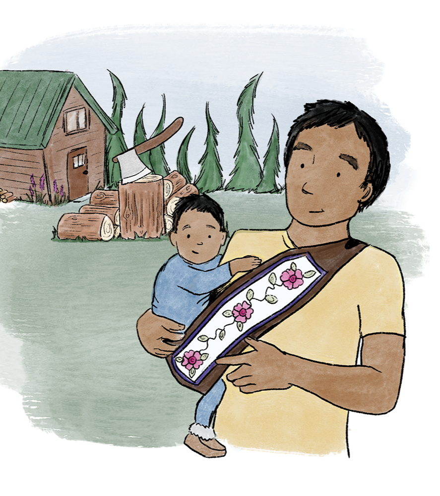 A man holding a young child in his arms, standing outside near a small house with a green roof. The man is wearing a yellow shirt and holding a decorated tray with pink and white flowers. In the background, there are stacked logs and tall trees.