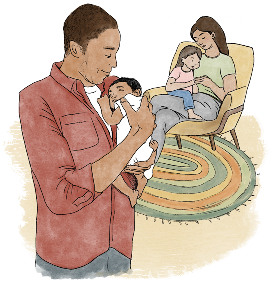 A man holding a newborn baby, a woman sitting on a chair with a young girl on her lap, in a cozy living room.
