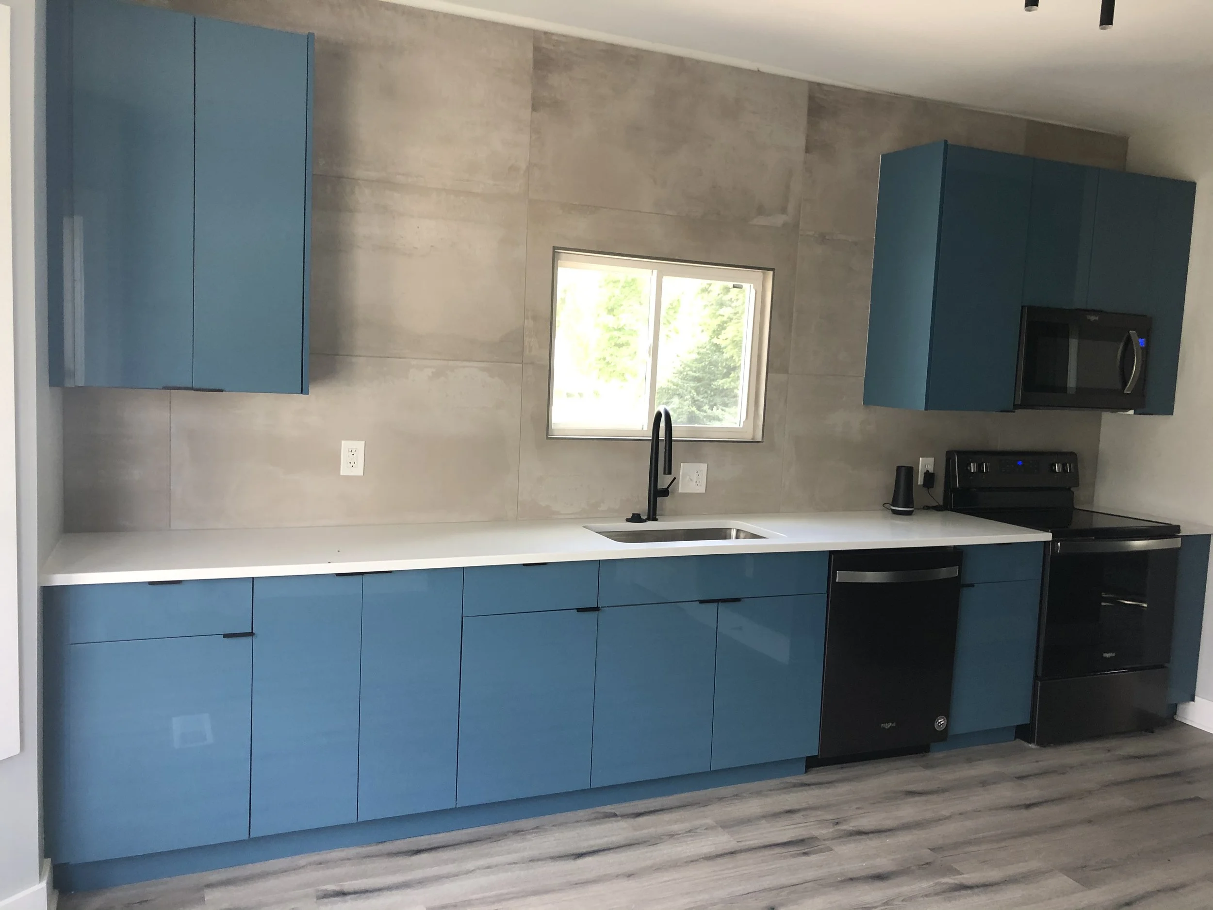 Contemporary Kitchen Remodel by Kirkland Construction LLC project photo