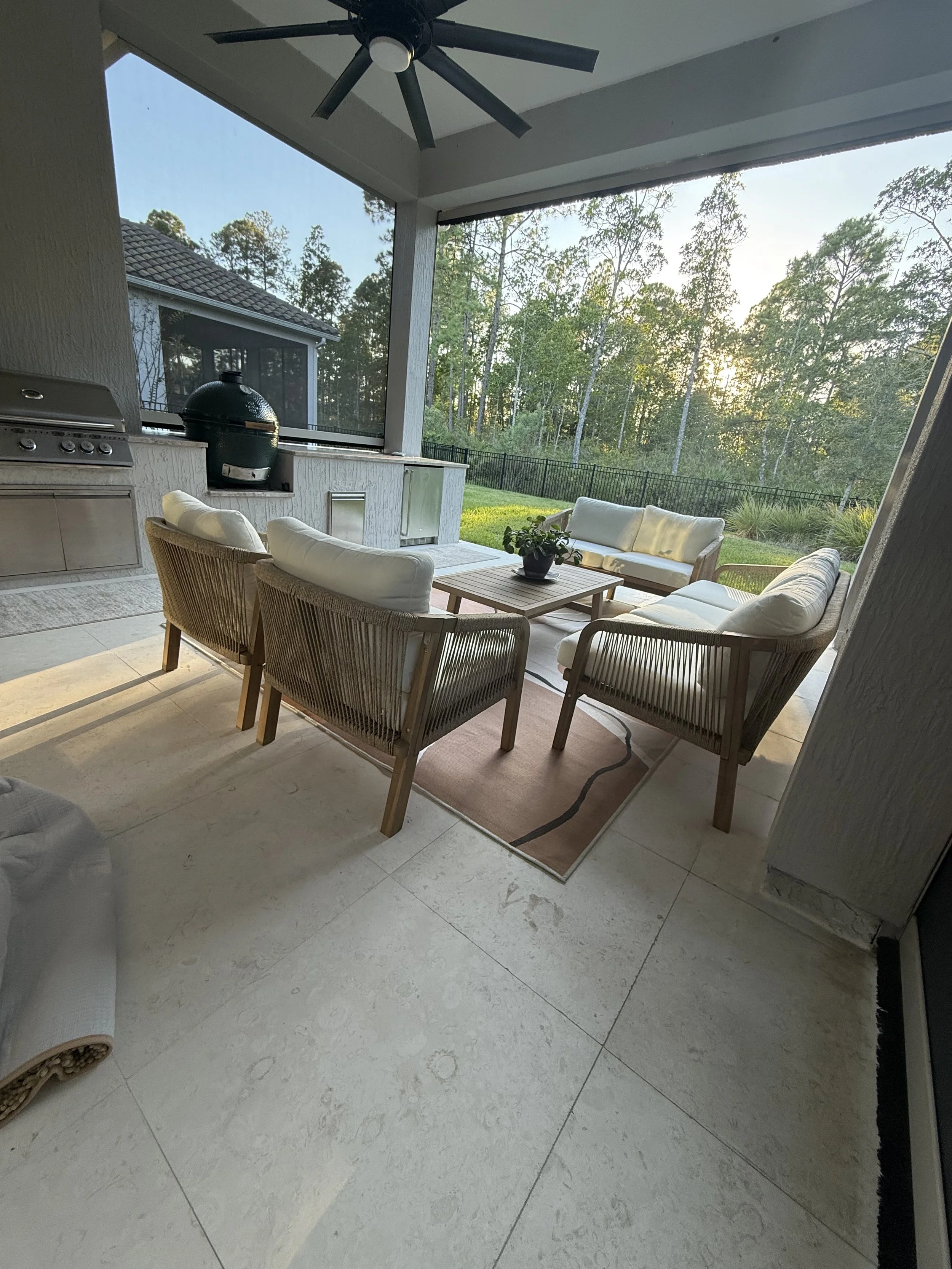 Tamaya Summer Kitchen - Built in Summer kitchen including sink, Gas Grill, XL Green Egg, Trash, Fridge and Storage openings topped with Taj Mahal Quartz countertops.  Honed Limestone 24x24 tiles for the Patio floor