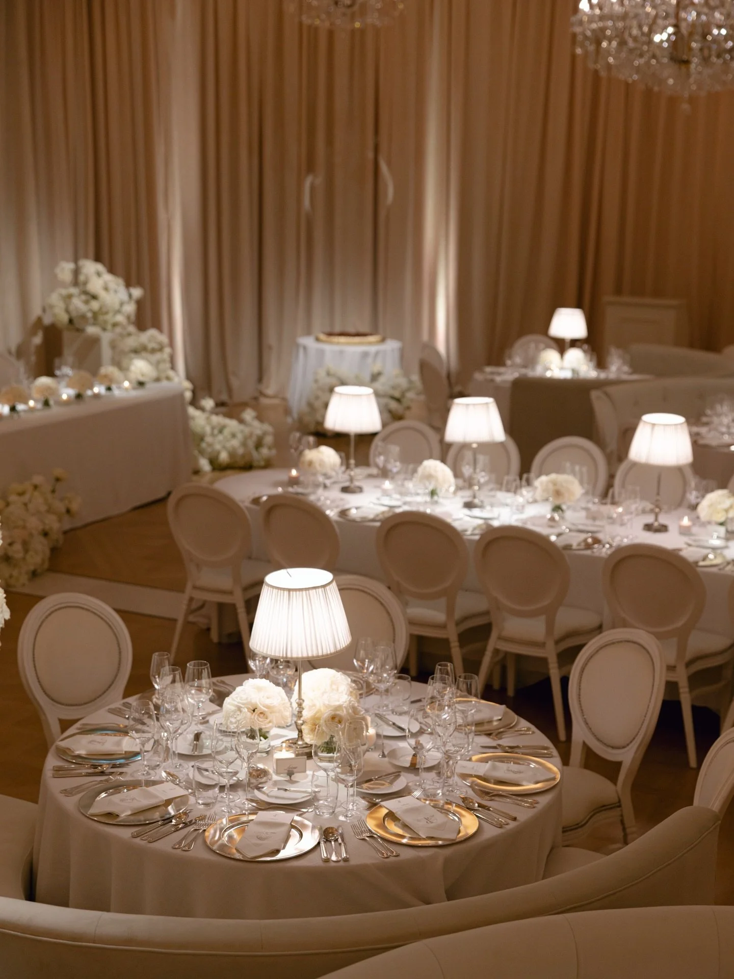 From Adare Manor to a chic New York City hotspot, this reception was designed to feel like stepping into an iconic Manhattan restaurant - intimate, glamorous, and effortlessly alive.

Custom-built booth seating, soft lamplight, layered white textures
