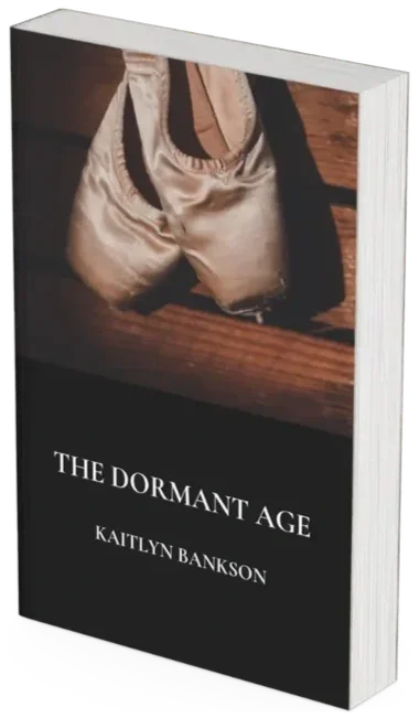 3D mockup of the paperback novel The Dormant Age by Kaitlyn Bankson, featuring a pair of worn satin ballet pointe shoes hanging against a wooden background on the book cover.
