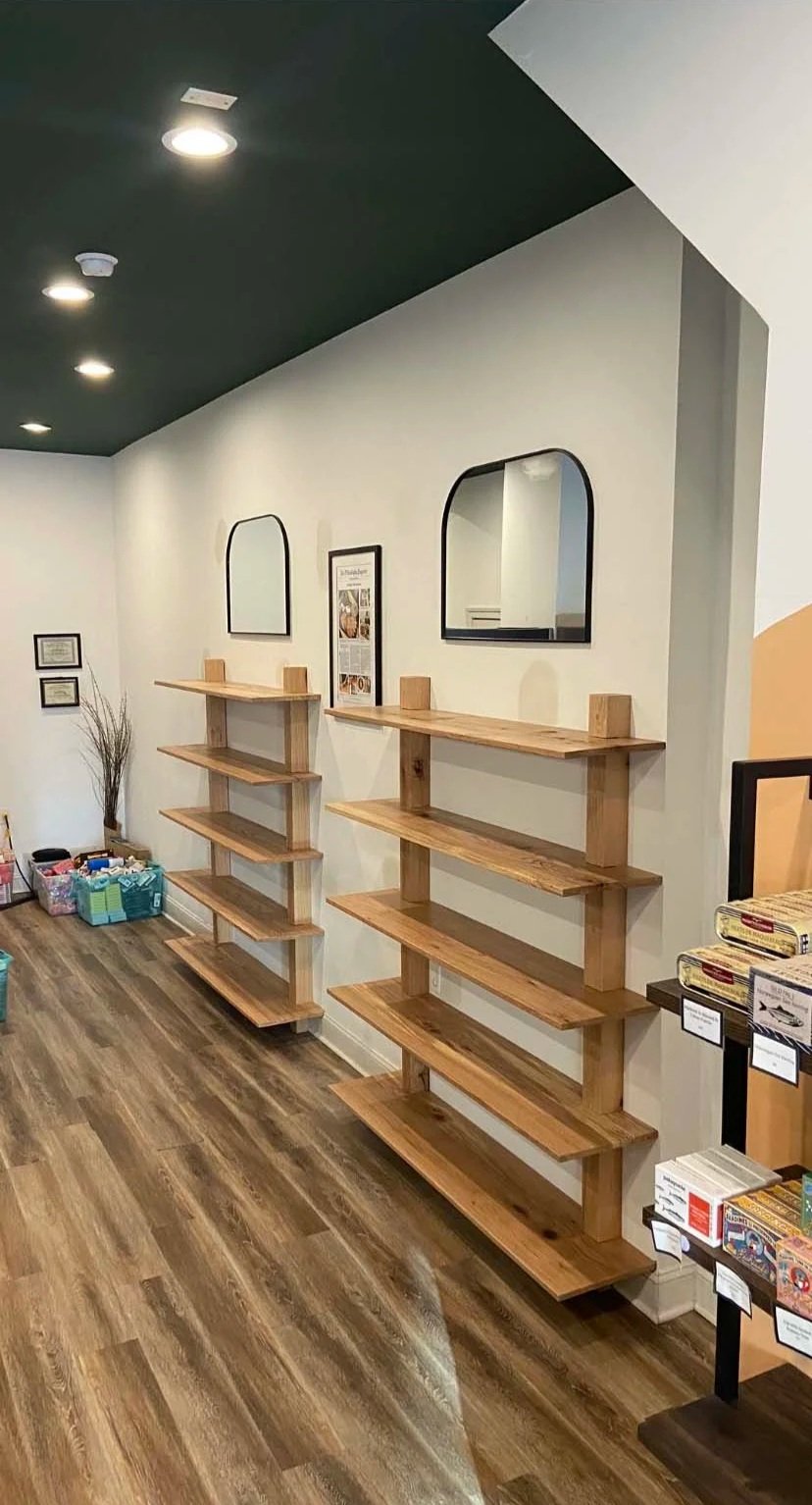 After - One-of-a-kind deep shelves crafted from locally sourced and milled maple slabs with dado and dovetail key joinery