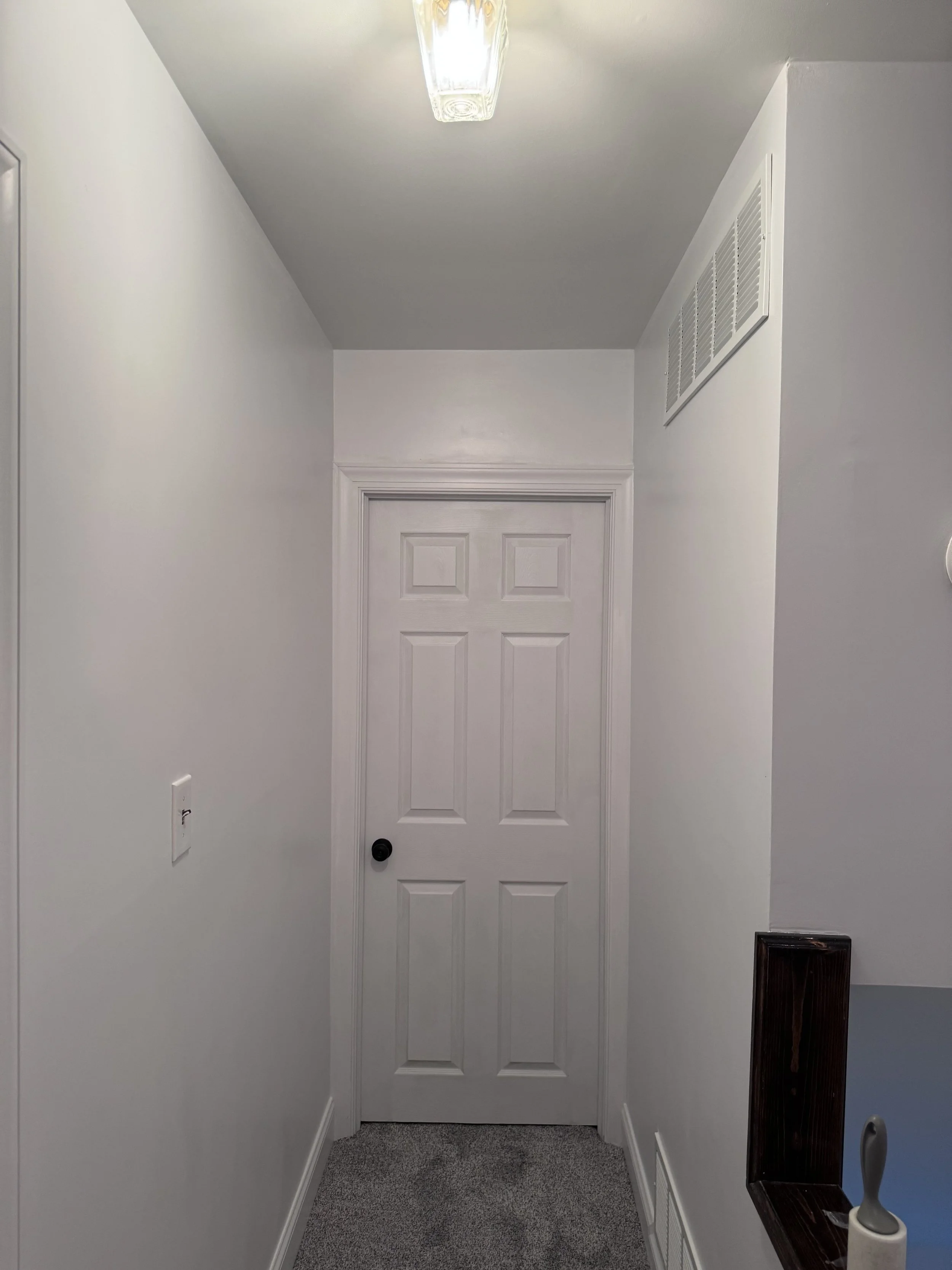 After - New  6-panel doors and hardware, SW Teapot Satin Paint, 3'' Solid Pine Door Molding