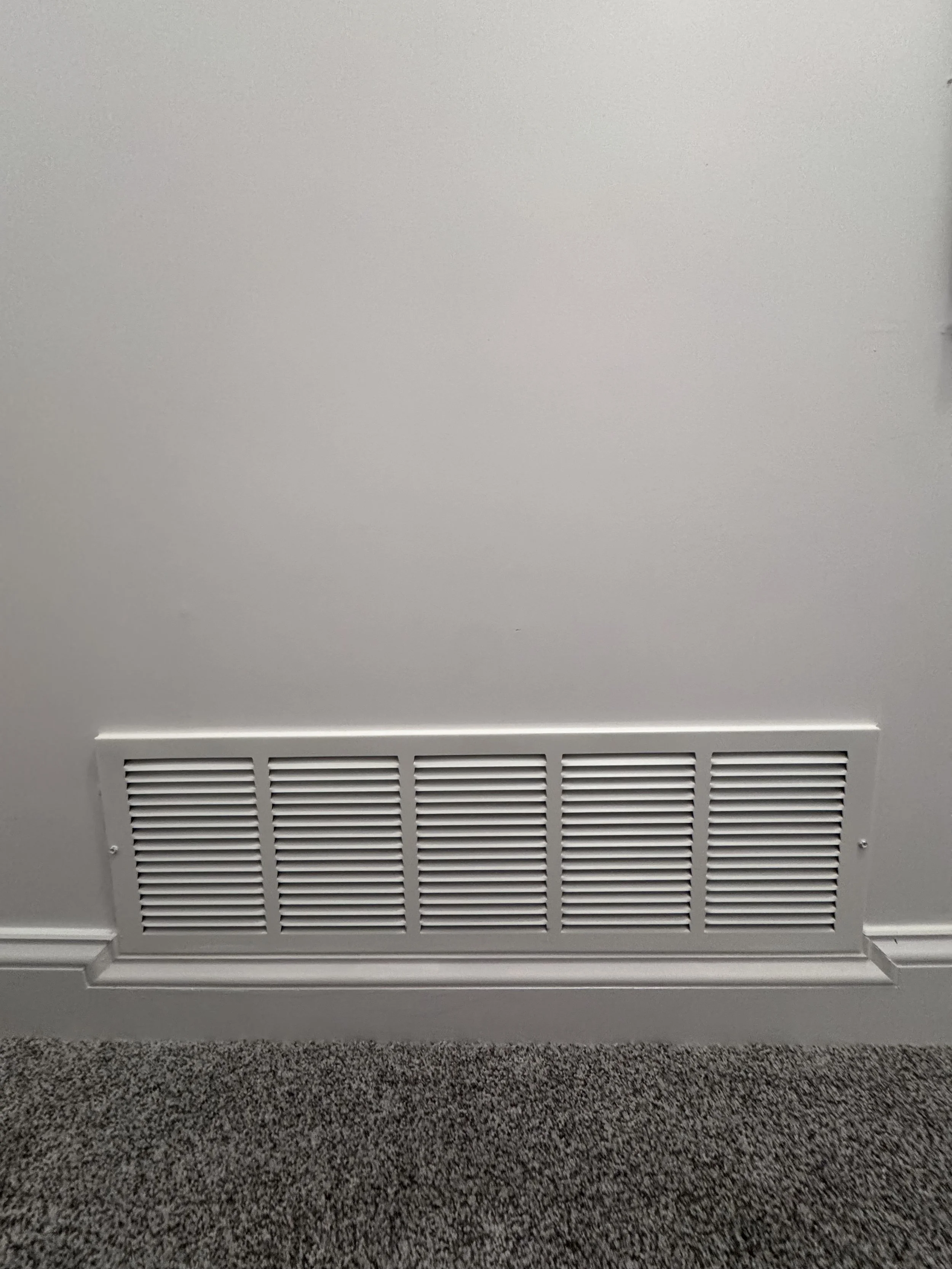 After - Custom trim work around central air return