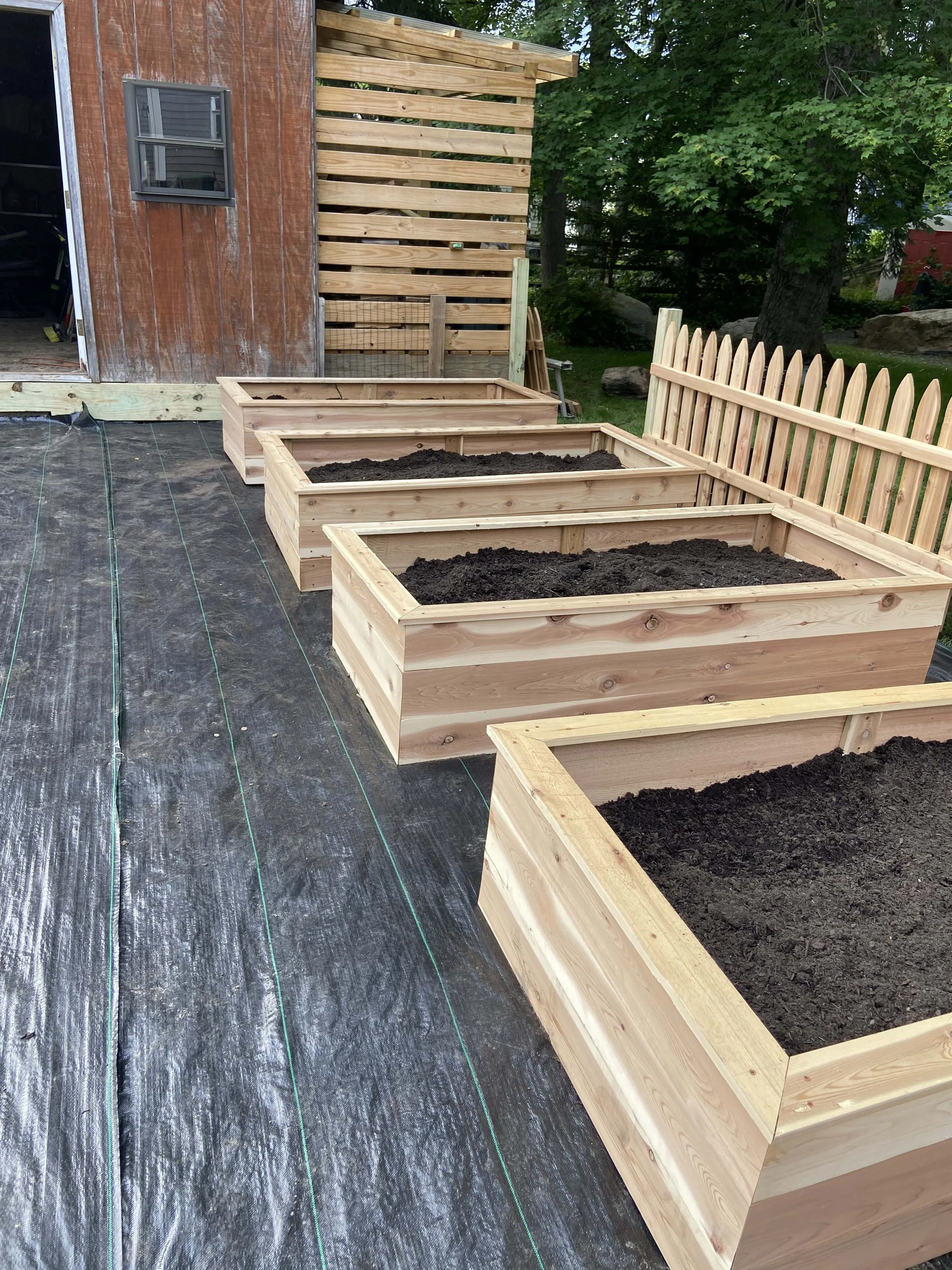 During - Hand crafted cedar garden beds for raised bed gardening