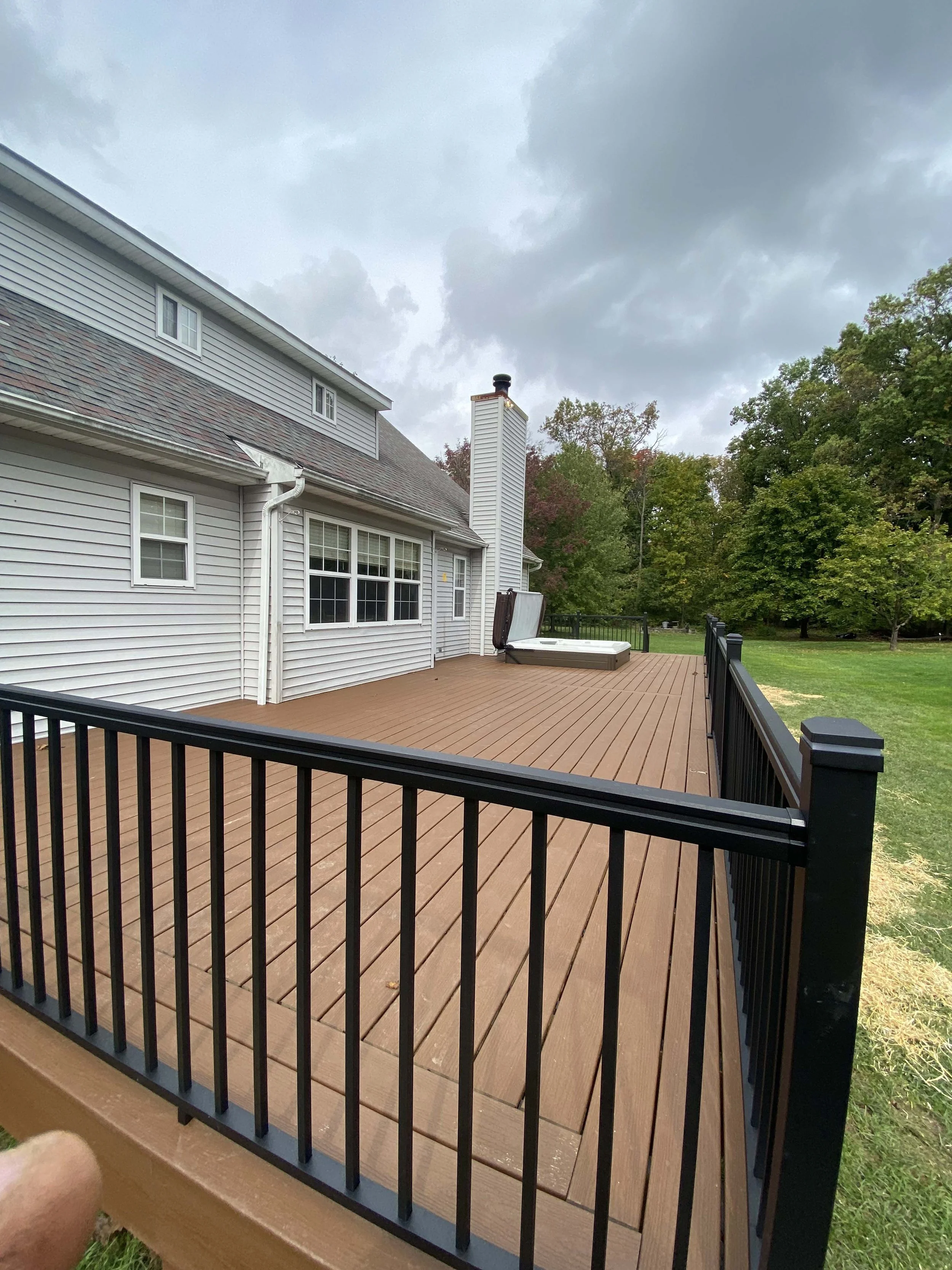 After - Composite Deck  with Black 2.5'' aluminum rail system