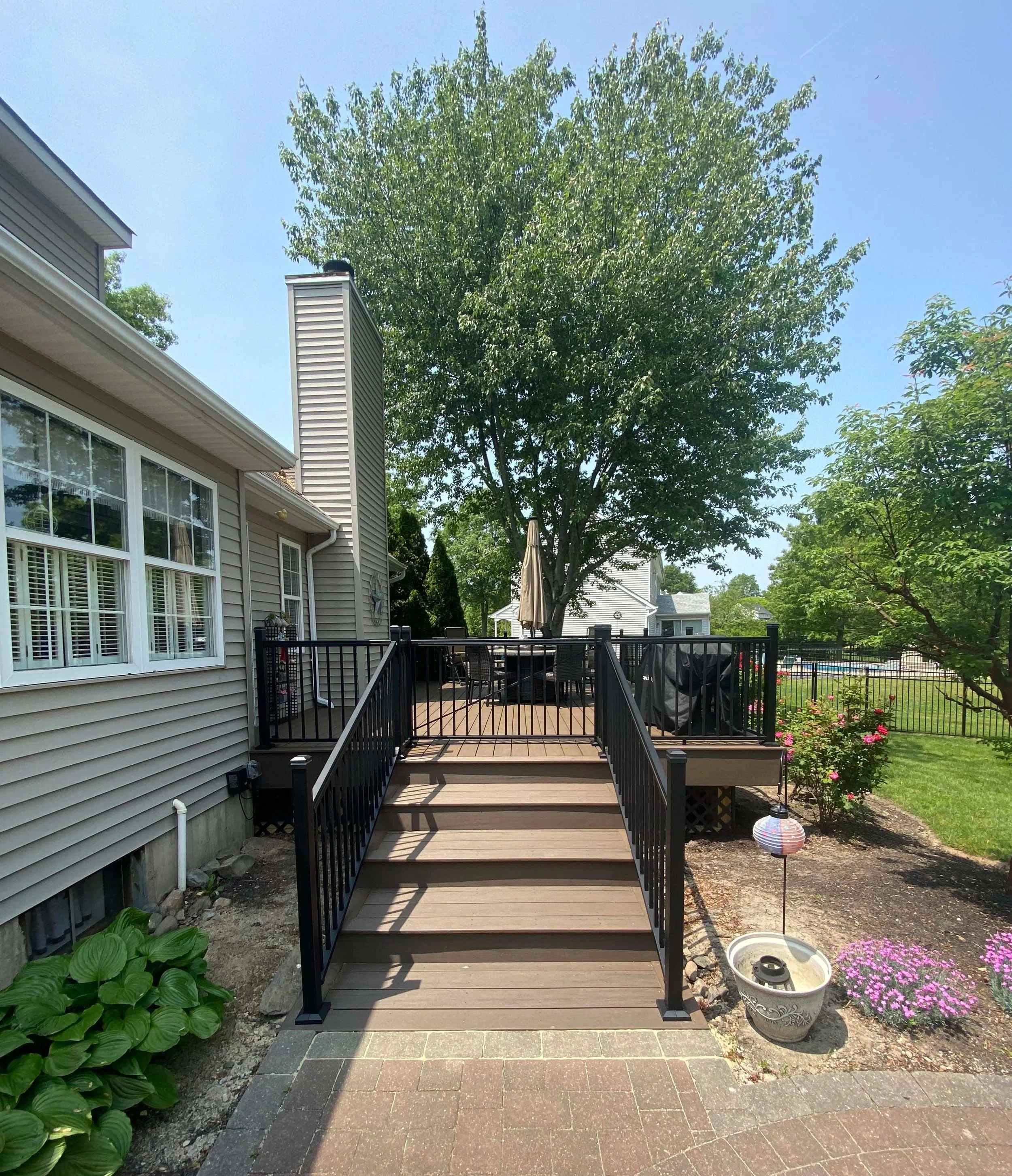 Composite Deck with Rolling “Pocket” Railing