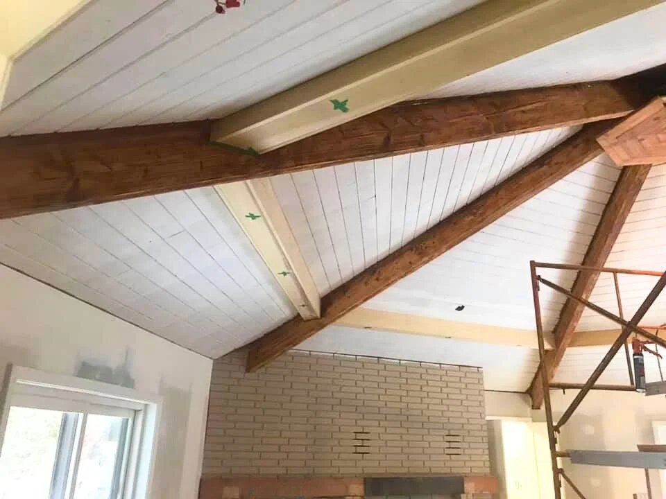 Custom carpentry work for lighting. Refinish on timber beams.