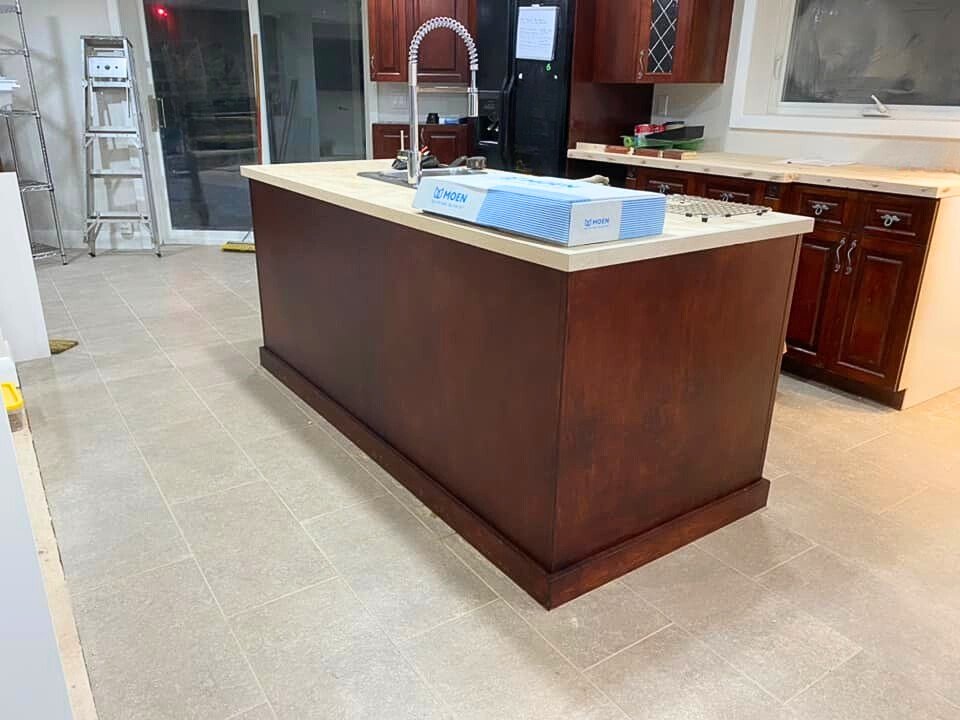 Custom kitchen island and tile.