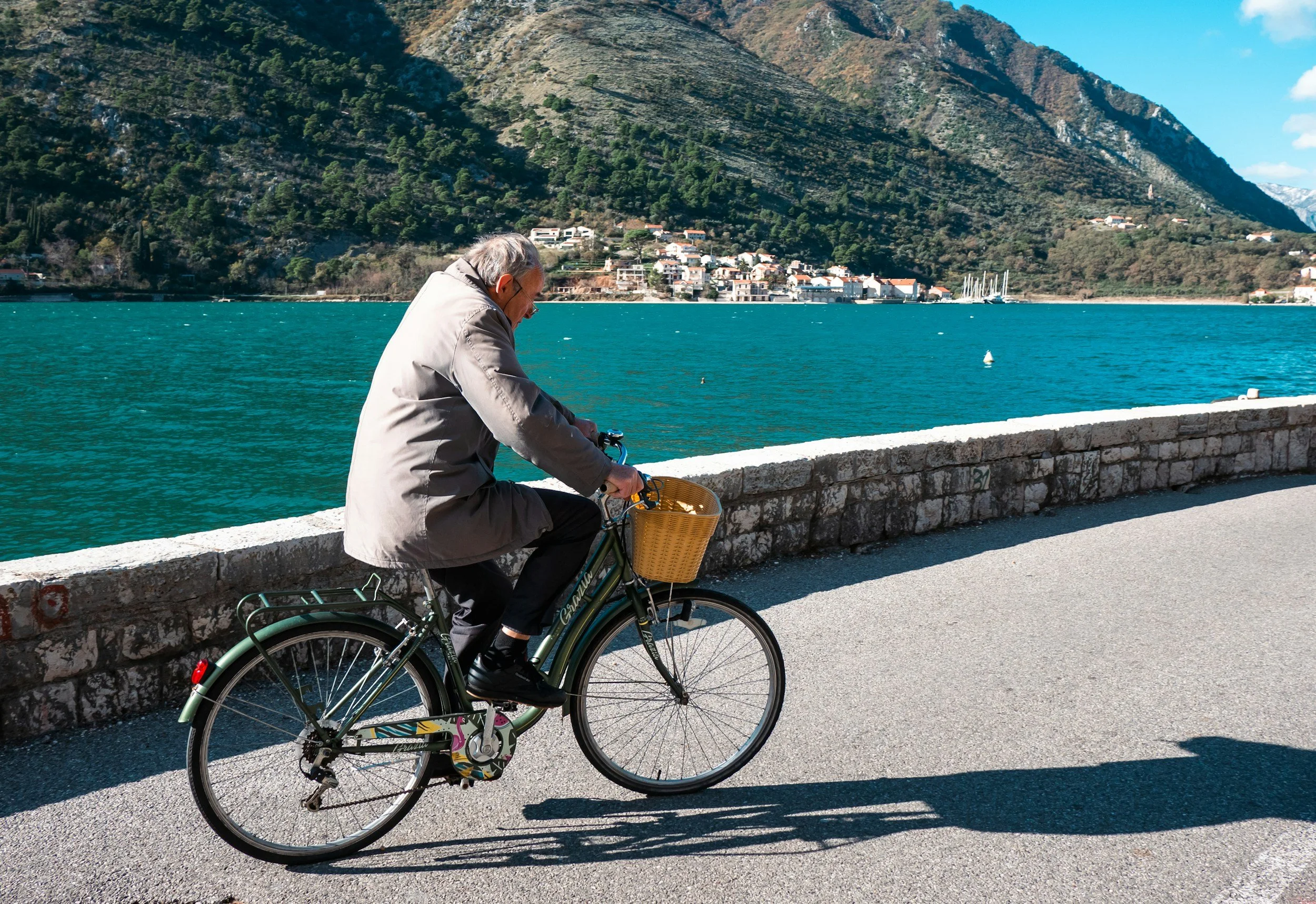 Man riding bike outdoors for daily movement and wellness
