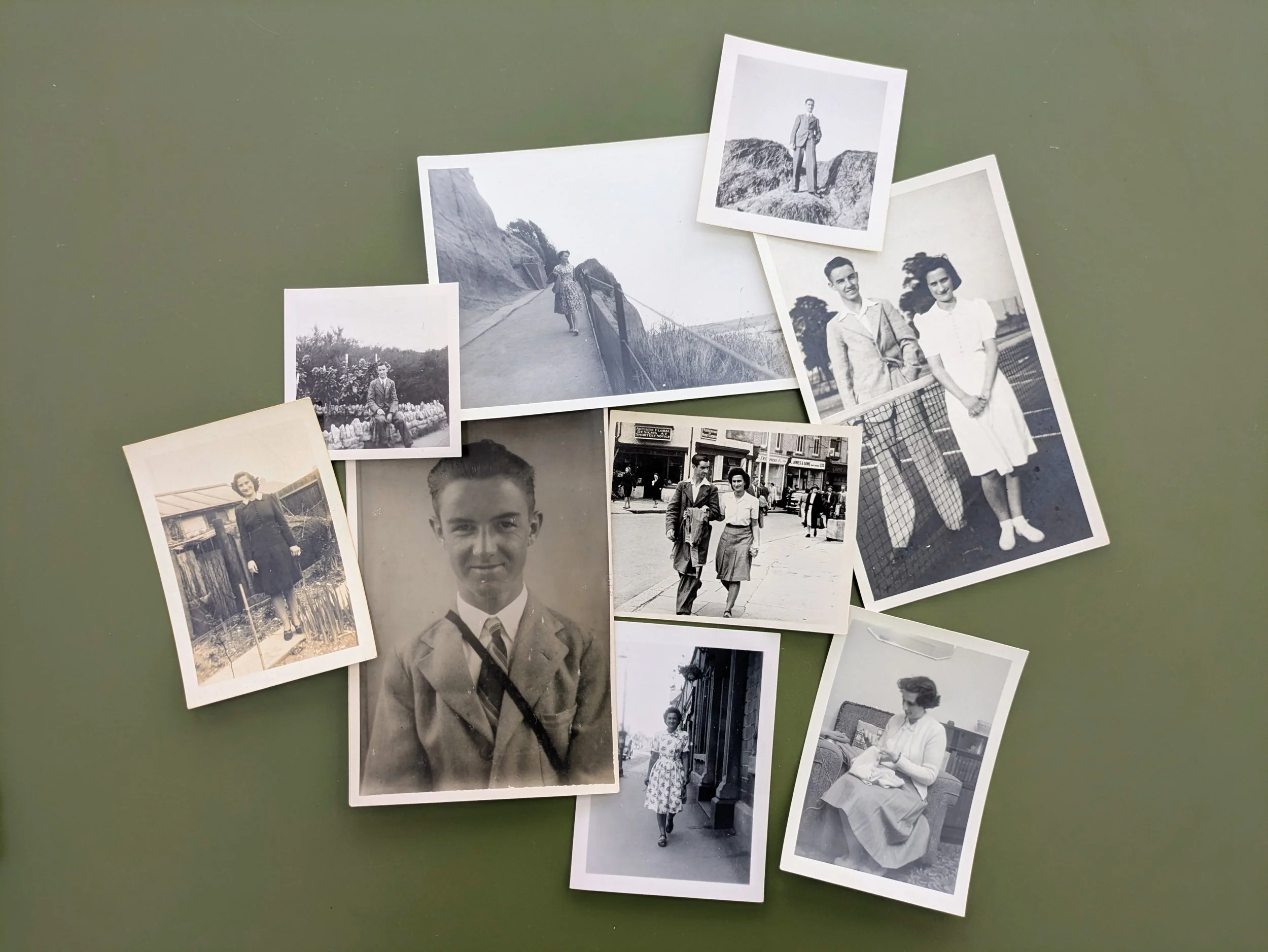 A collection of black-and-white photographs of people from the mid-20th century, featuring individuals in outdoor and city settings.