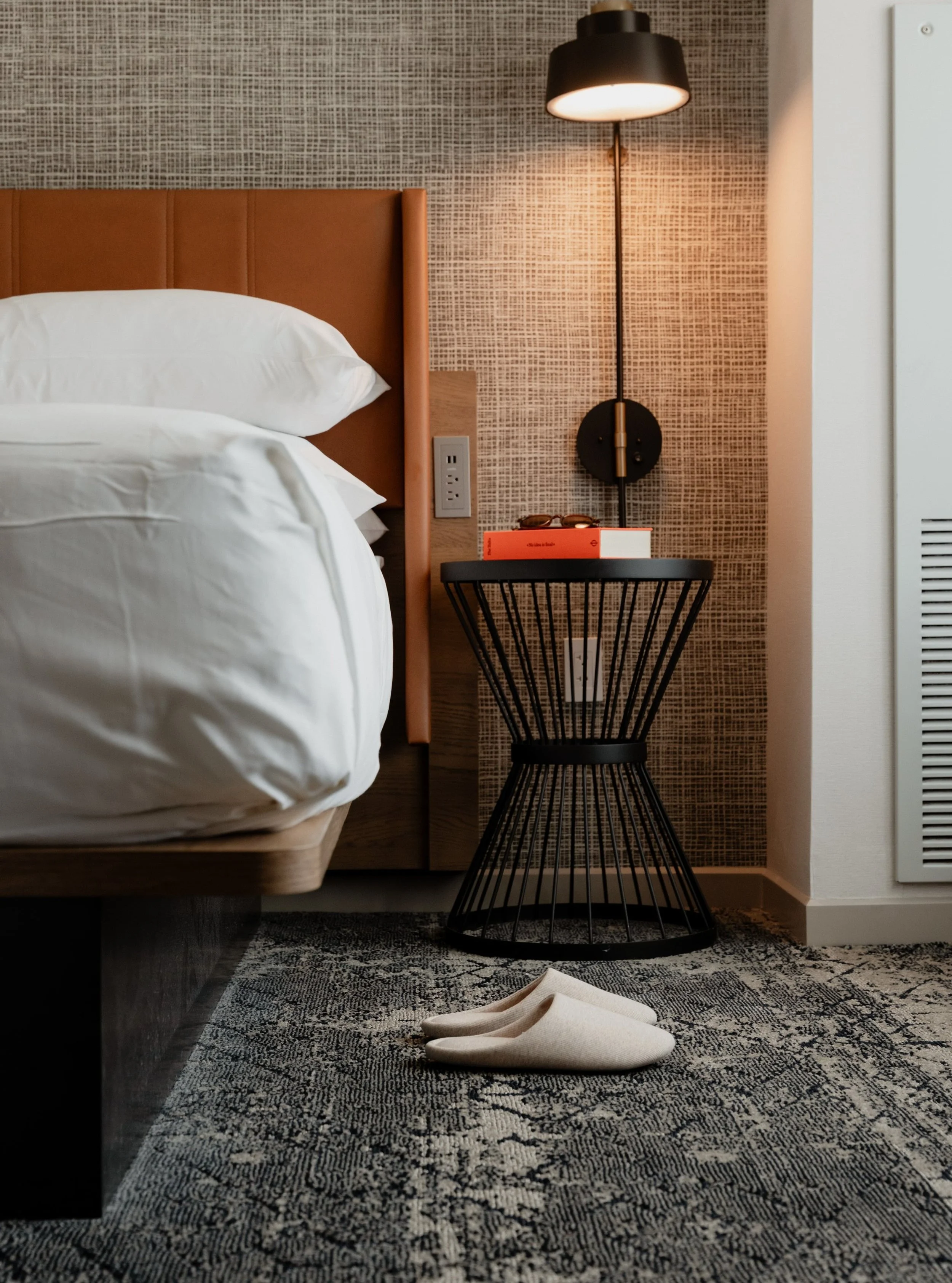 The details that make a hotel room feel like a personal retreat. Layering textures, and lifestyle elements to capture the guest experience.