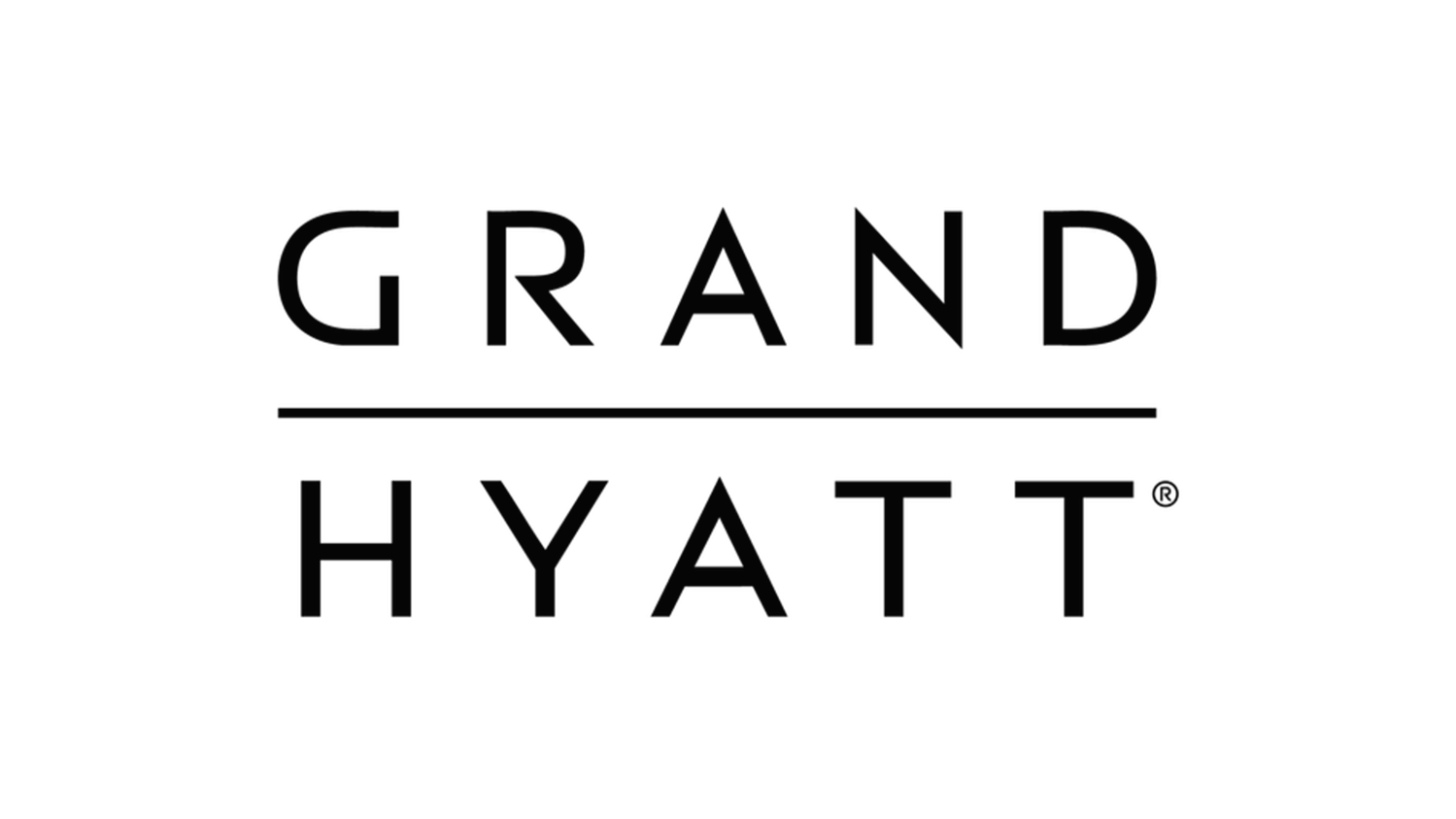 Logo of Grand Hyatt hotel in black and white with the words 'Grand Hyatt' separated by a horizontal line.