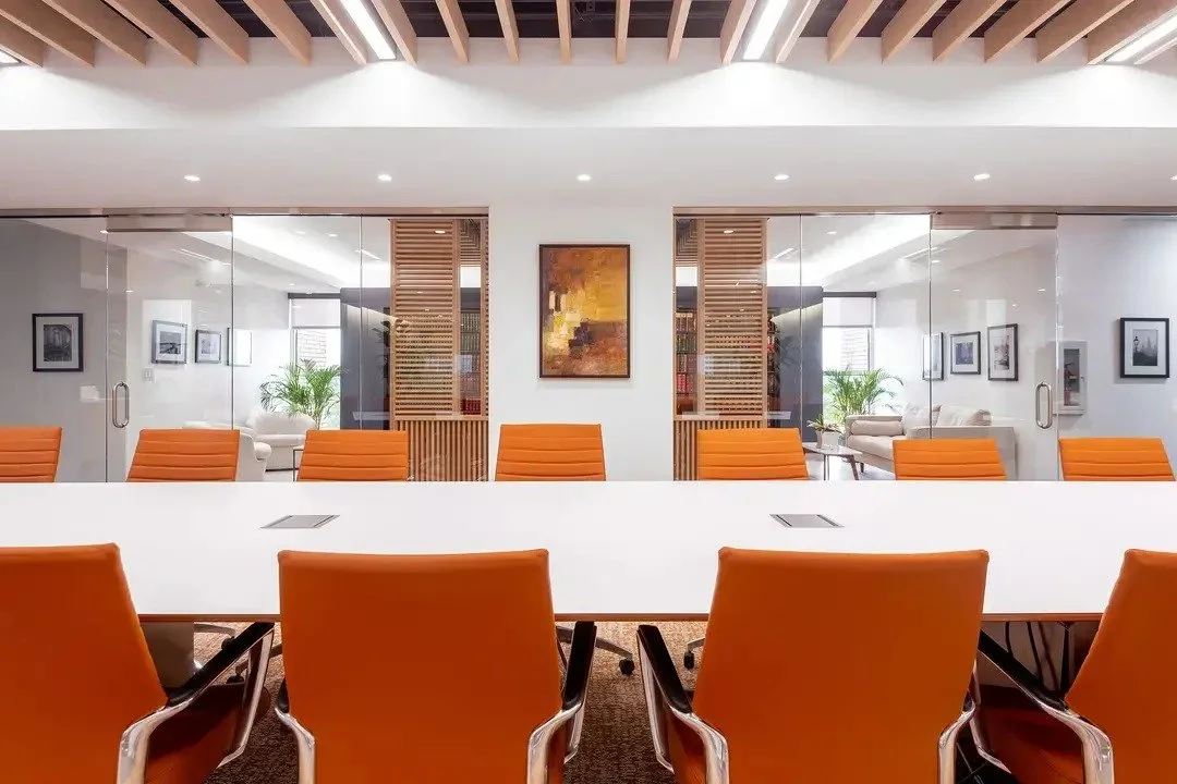 Accord — orange chairs conference table view