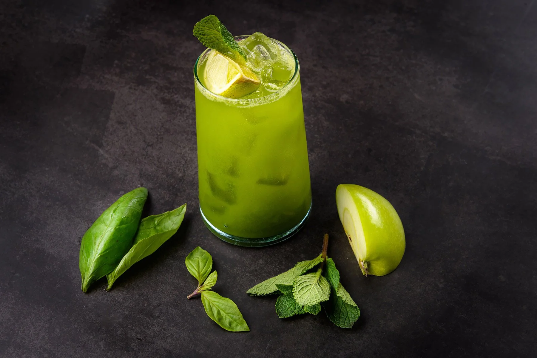 Commercial shot of a luxury cocktail with condensation on the glass and sharp focus.