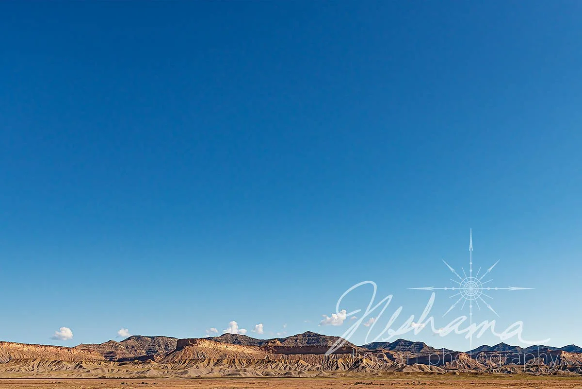 Blue Skies Over Rainbow Mountains | Utah