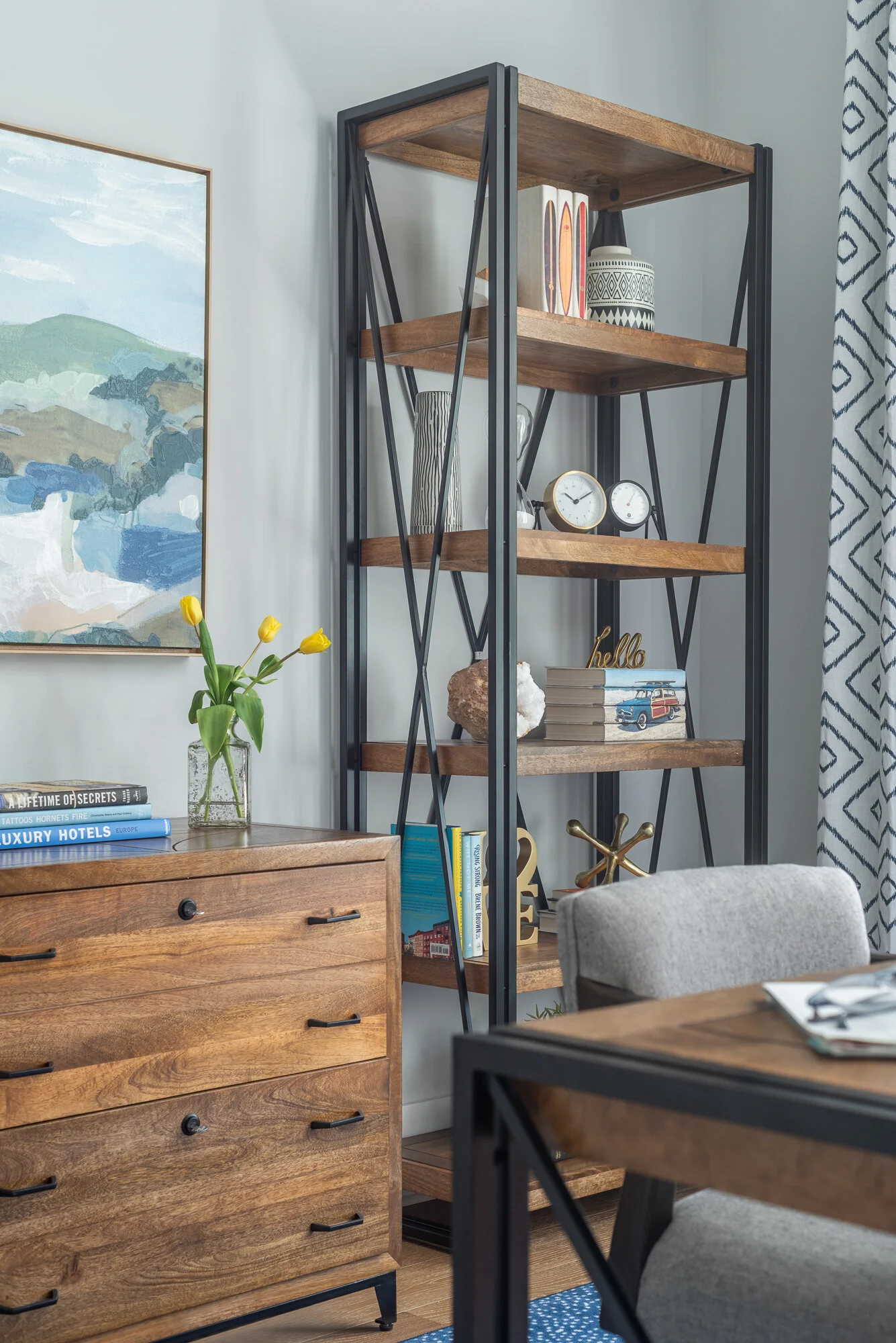 Wood dresser and shelves with grey rolling desk chair