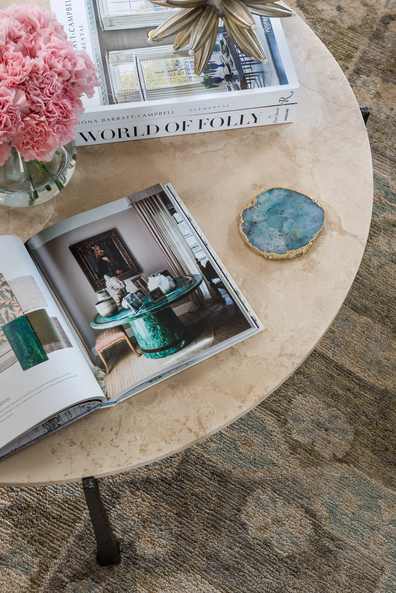 Marble coffee table with coaster and bouquet
