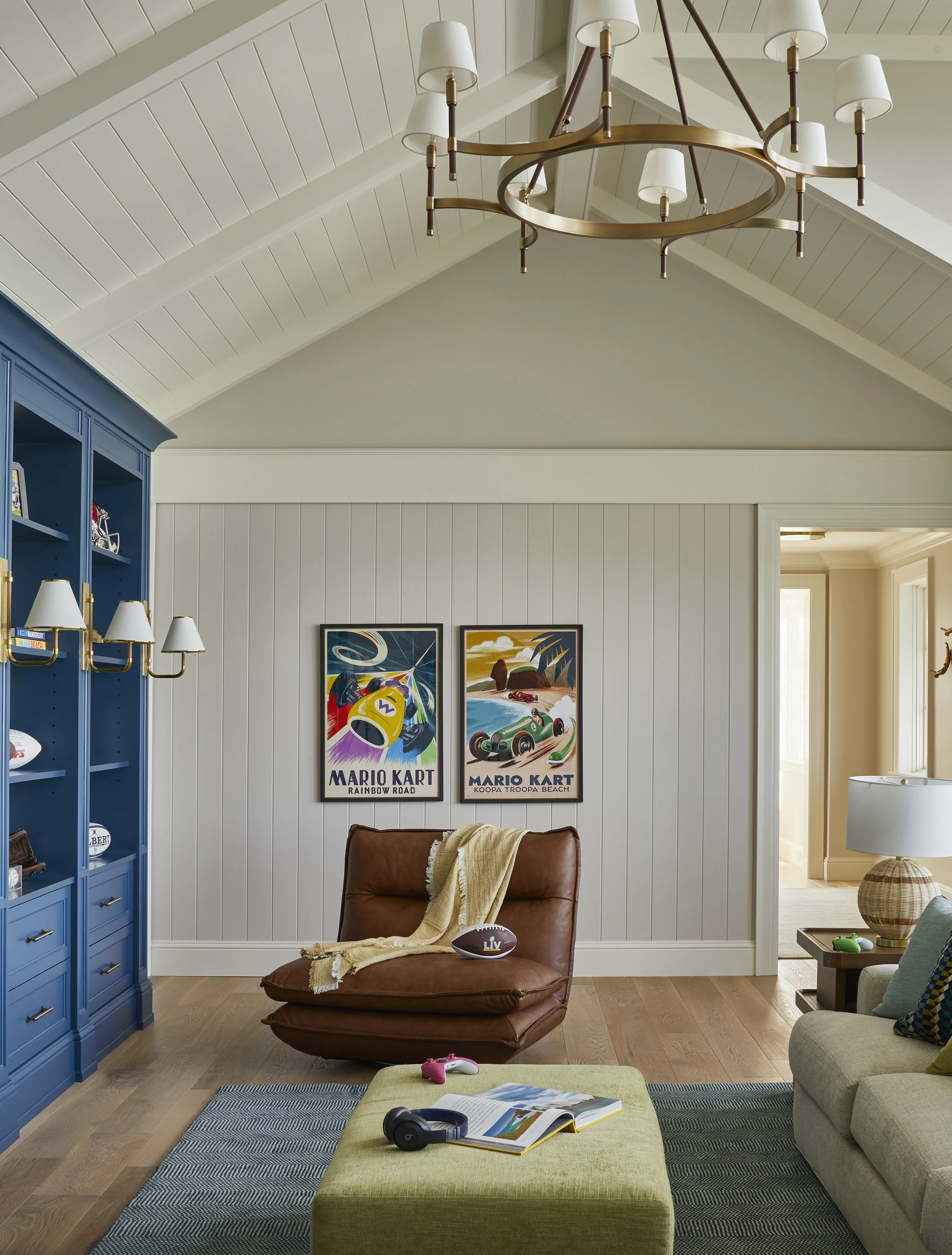  Brown leather recliner in a family den with built-in cabinetry 