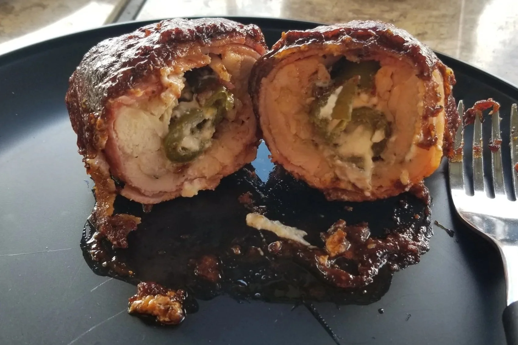 Cream cheese, jalapeno stuffed, bacon wrapped chicken thighs!